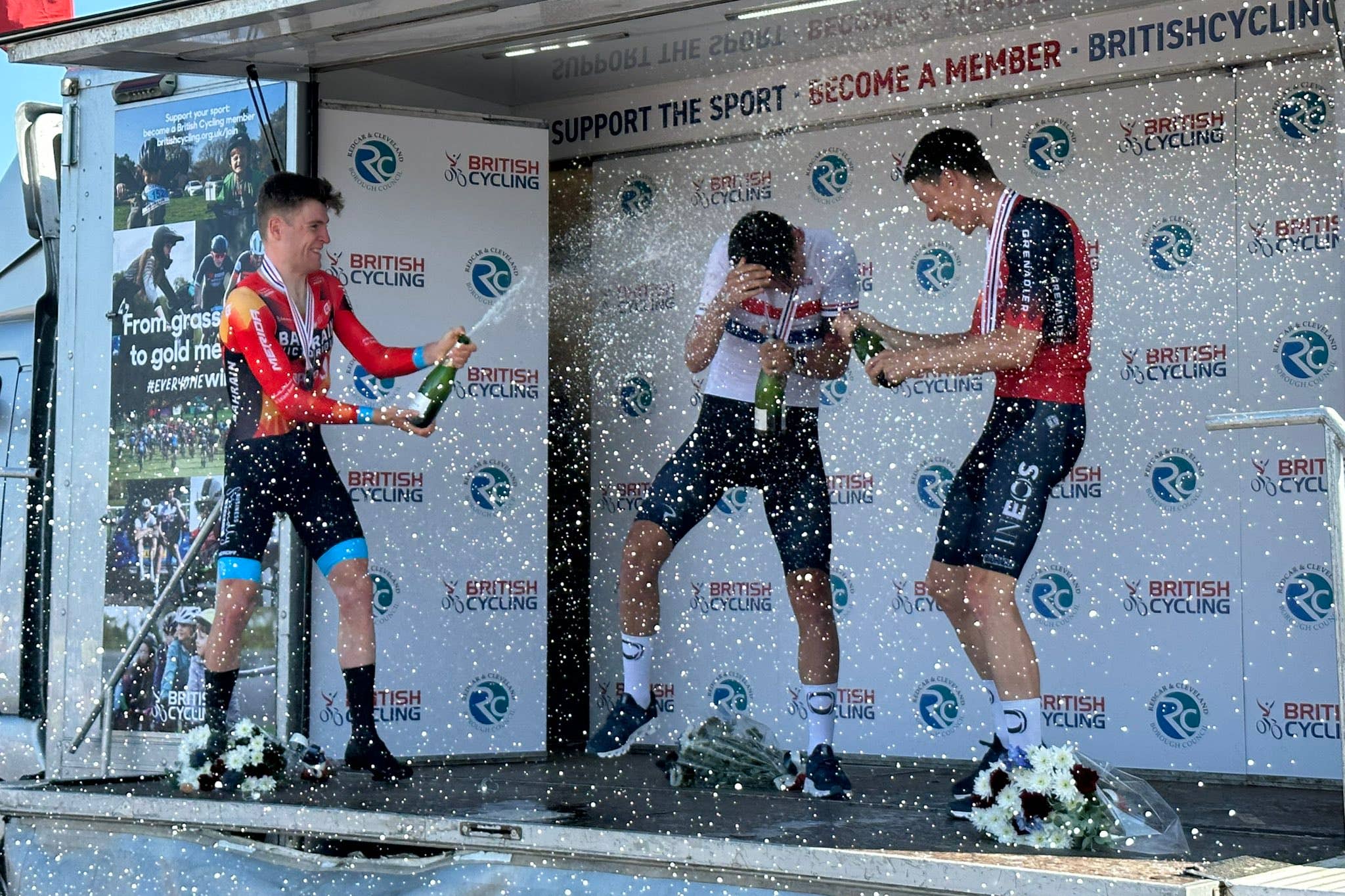 Josh Tarling (centre) has become the youngest ever elite men’s time trial winner (Ian Parker/PA)