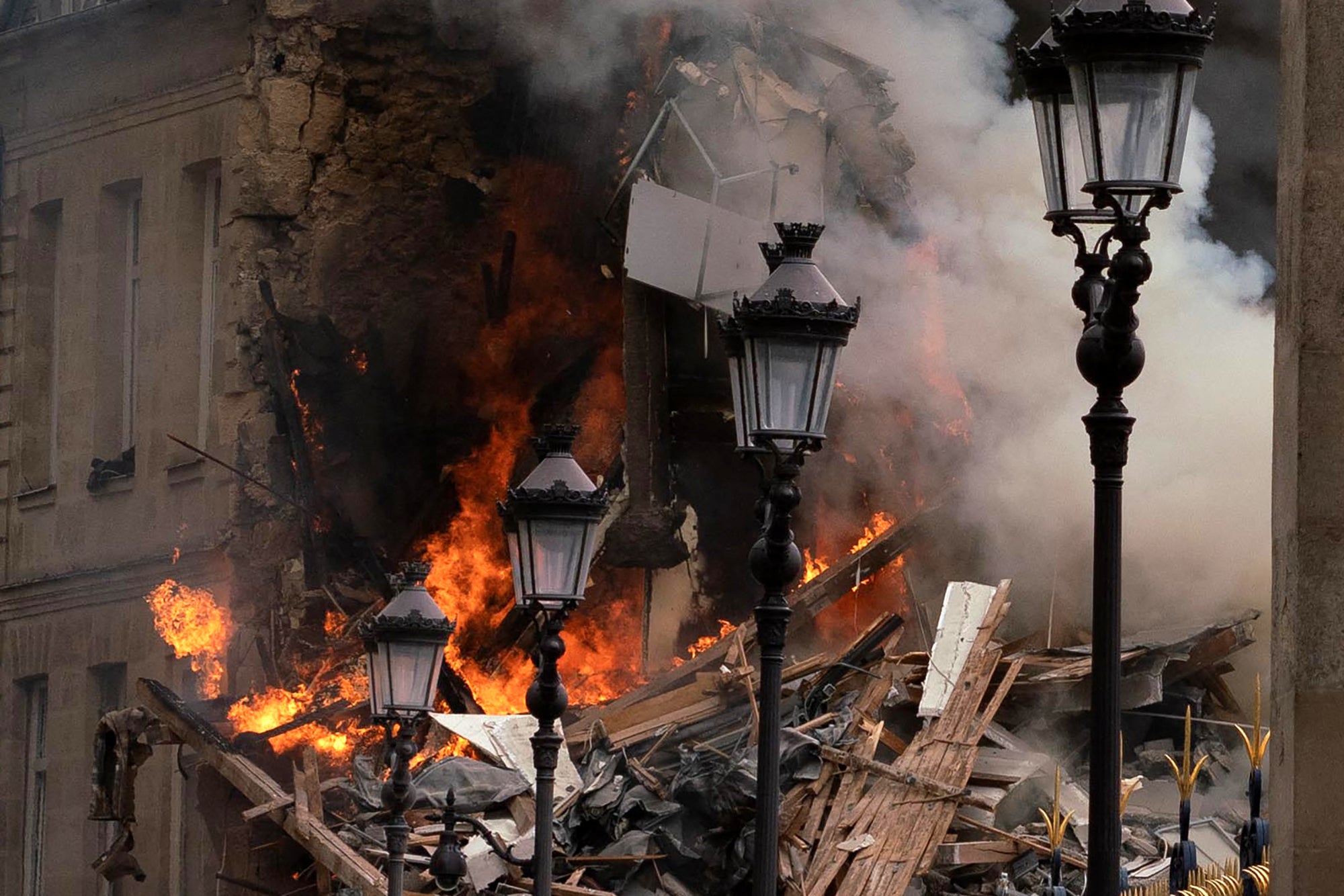 Smoke billows from the site of an explosion in central Paris