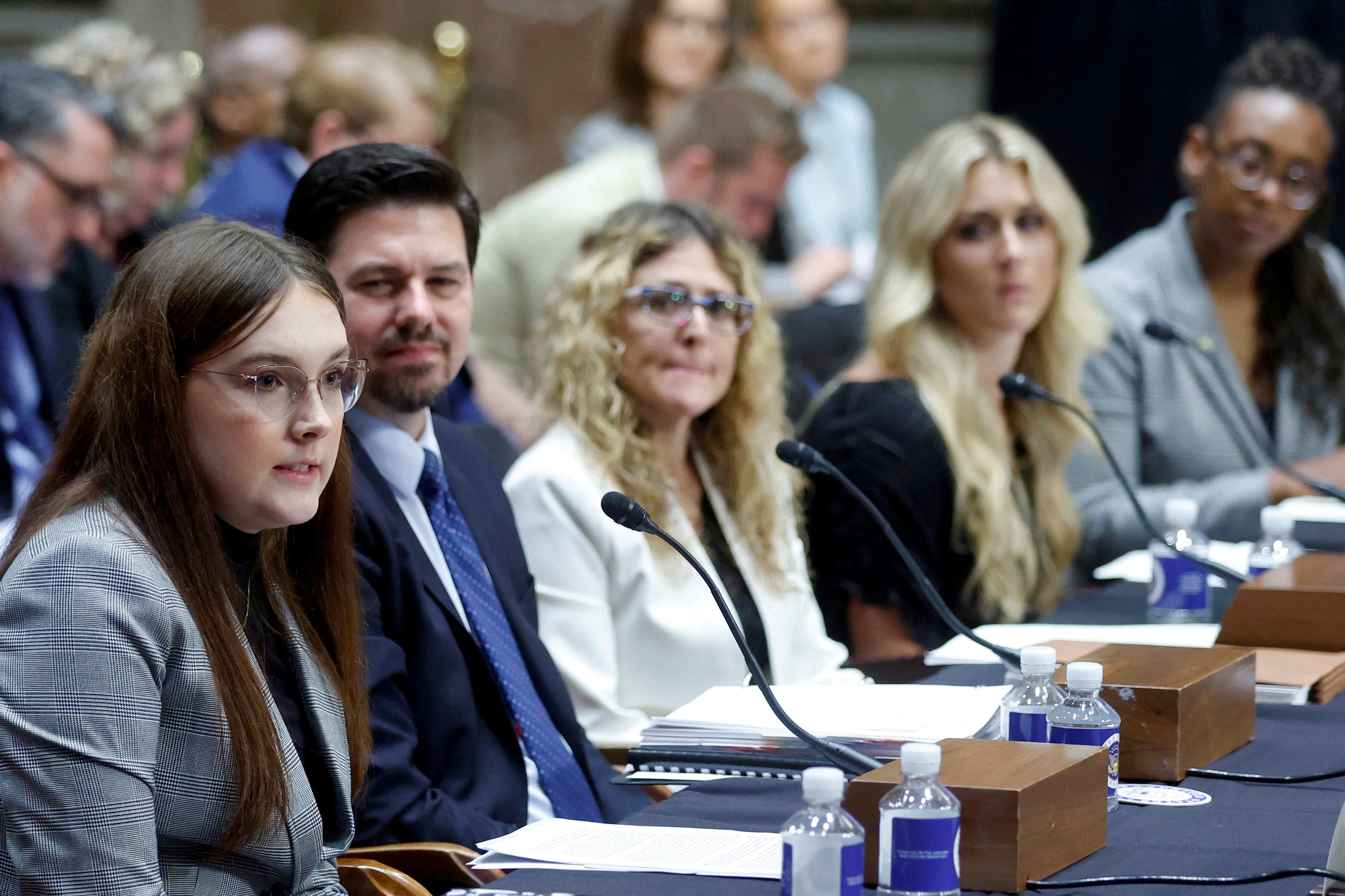 Harleigh Walker, left, testifies to a Senate Judiciary Committee hearing on LGBT+ discrimination protections on 21 June.