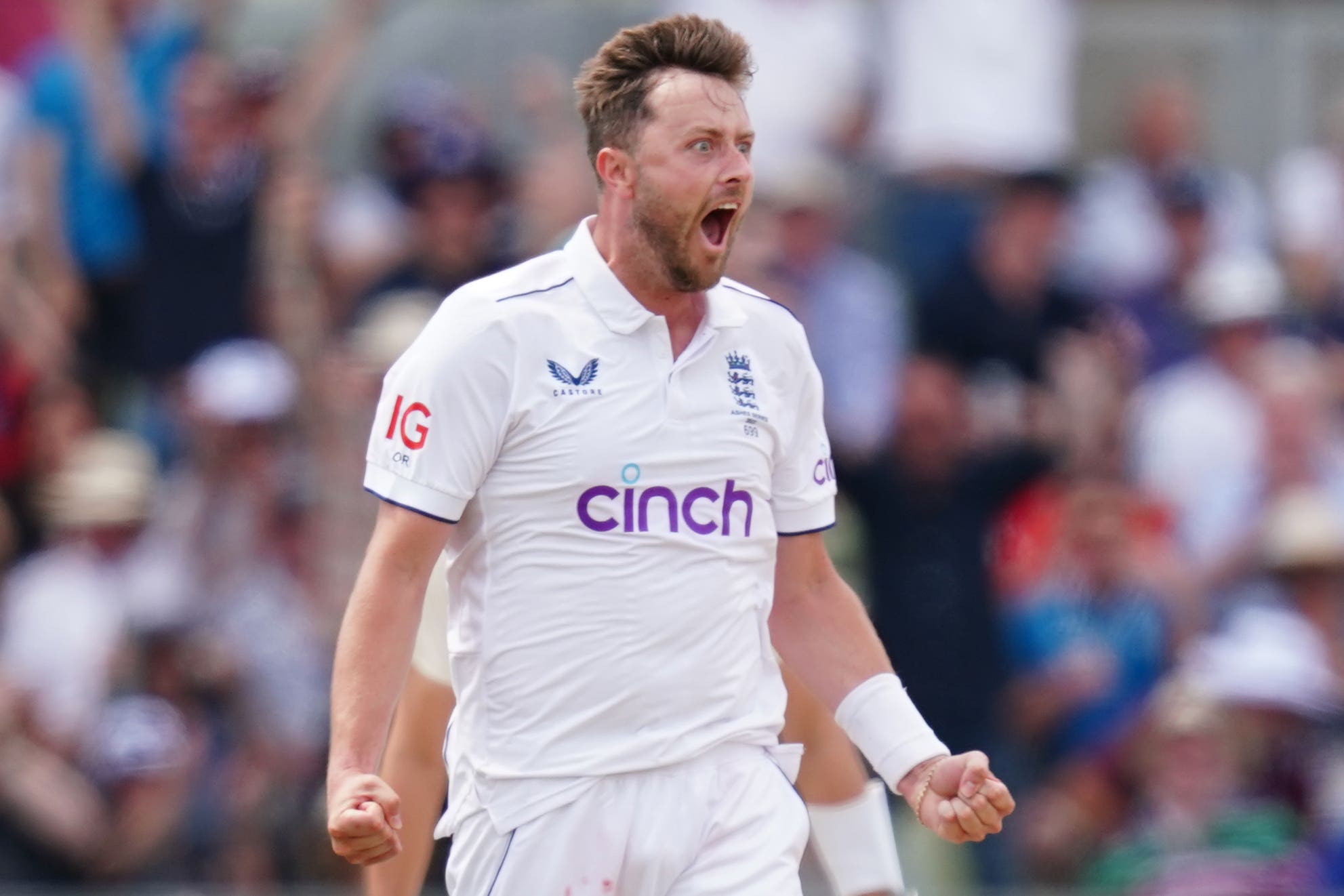 Ollie Robinson celebrates dismissing Usman Khawaja during the first Test (David Davies/PA)