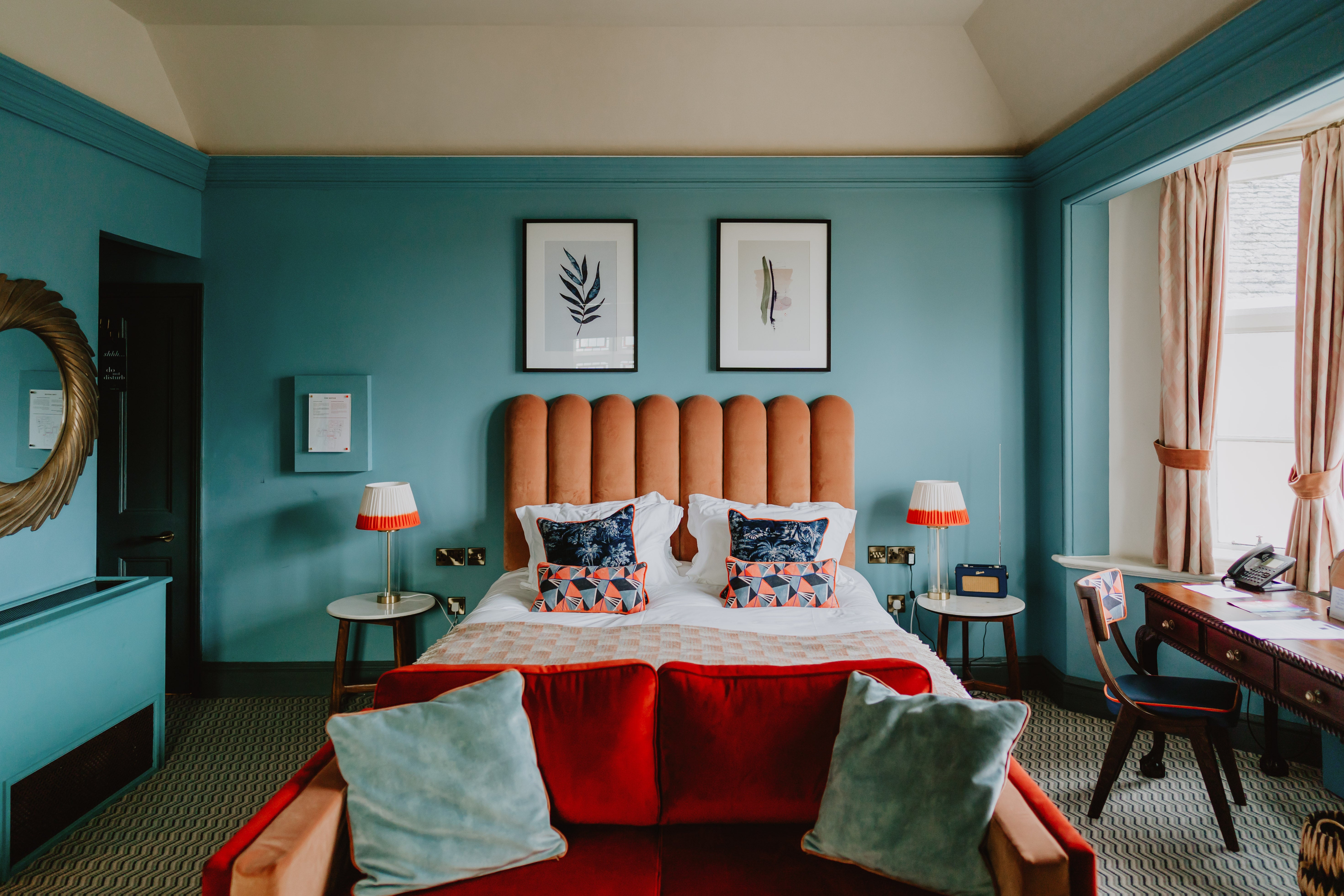 Vivid colours and retro furnishings make for welcoming rooms