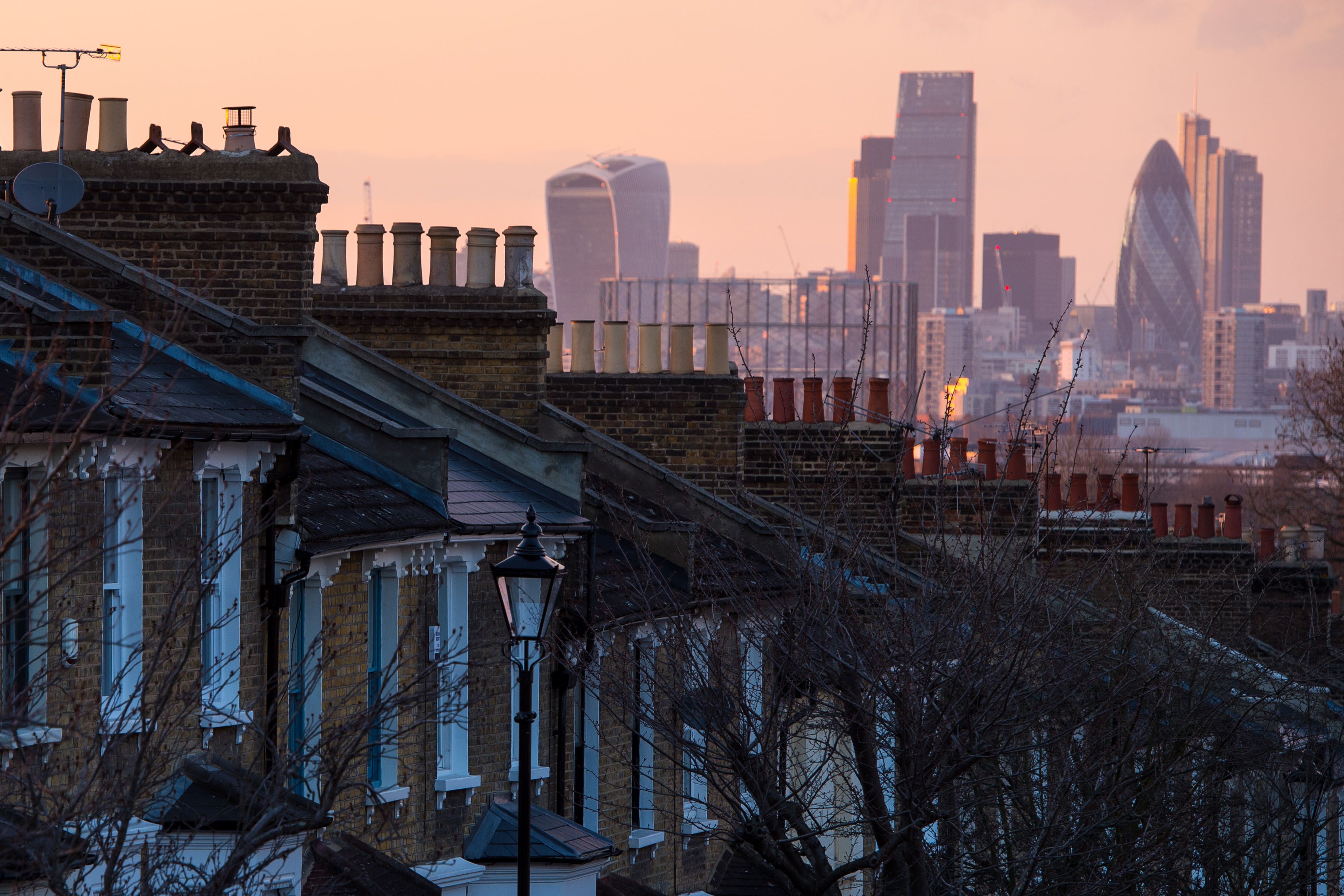 London’s FTSE 100 has fallen to a three-week low after a surprise sharp hike in UK interest rates stoked fears of a looming mortgage crisis (Dominic Lipinski/PA)