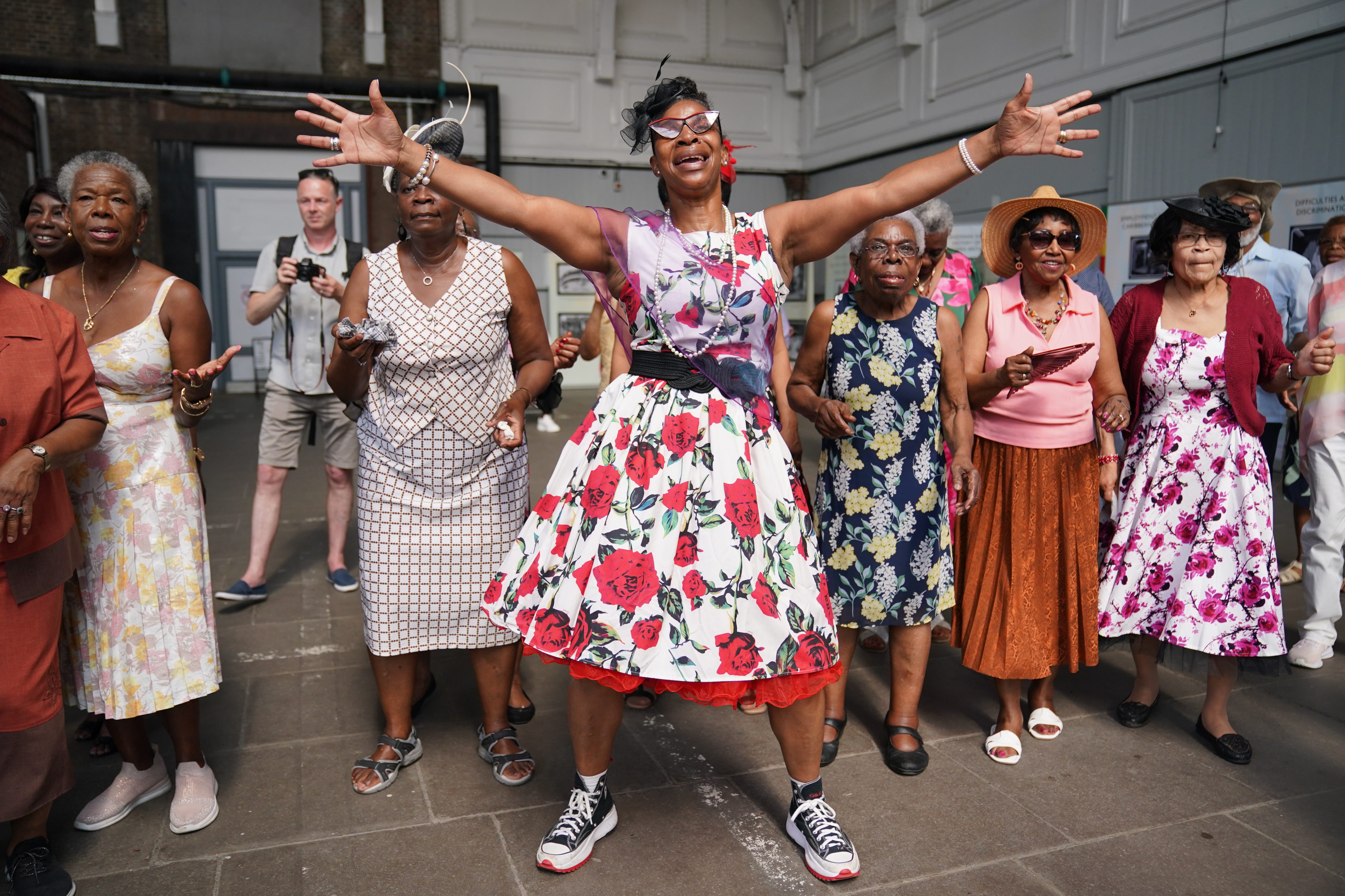 Guests dance at a reception following the arrival of a Thames Clipper at the Port Of Tilbury (Lucy North/PA)