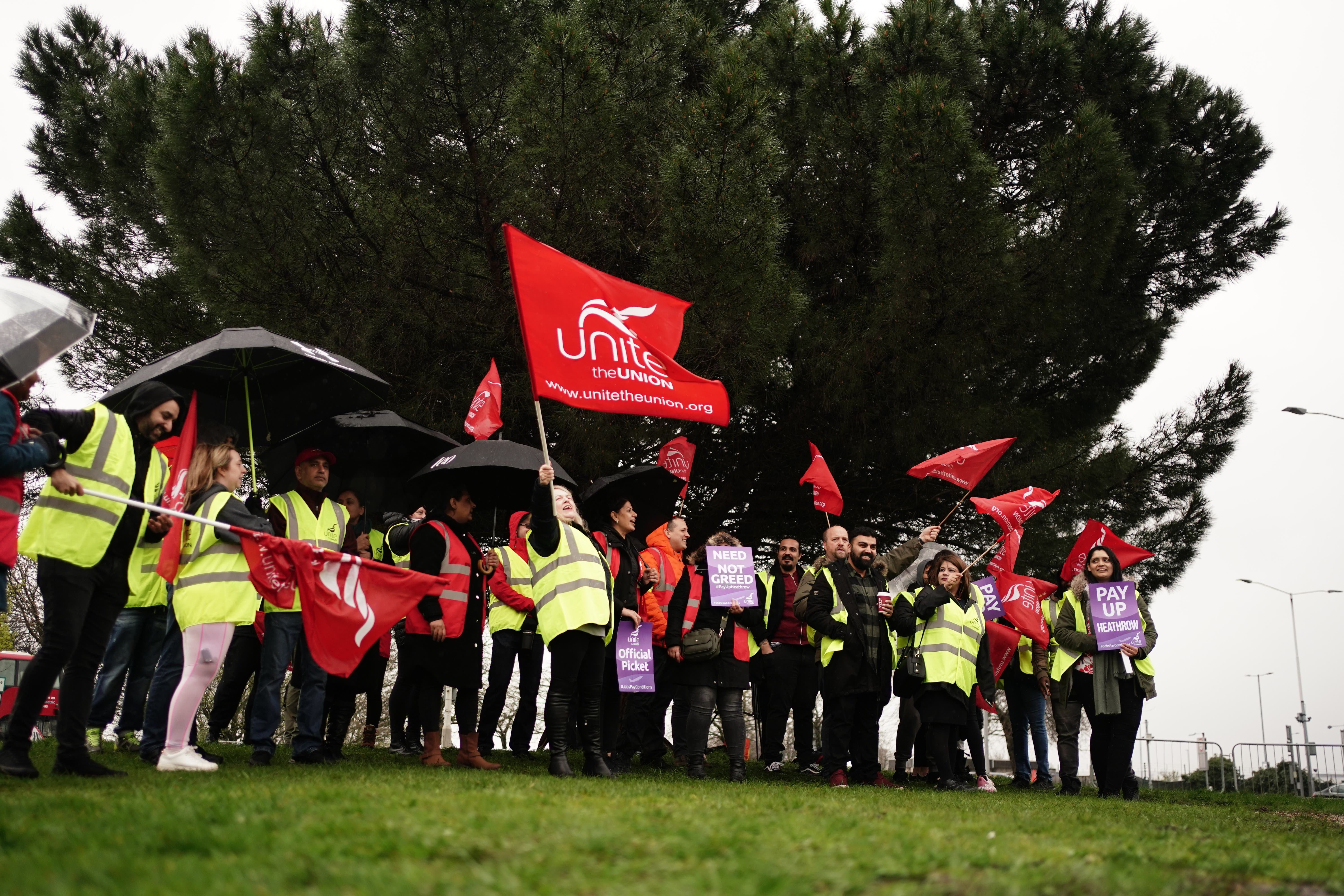 Security guard members of the Unite union on the picket line at Heathrow Airport, London in March this year (Jordan Pettitt/PA)