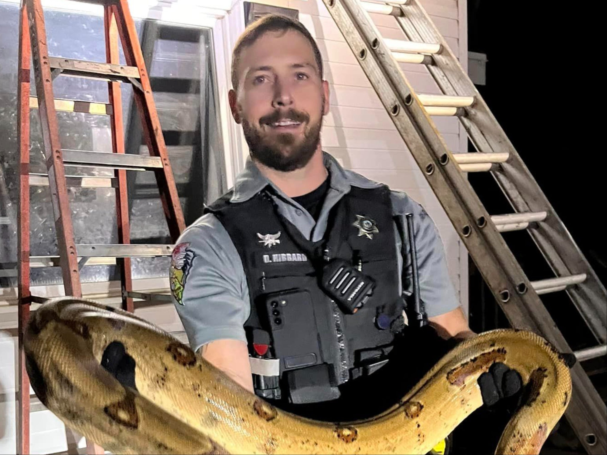 Firefighters pulled a giant boa constrictor from the roof of a Wisconsin home earlier this week