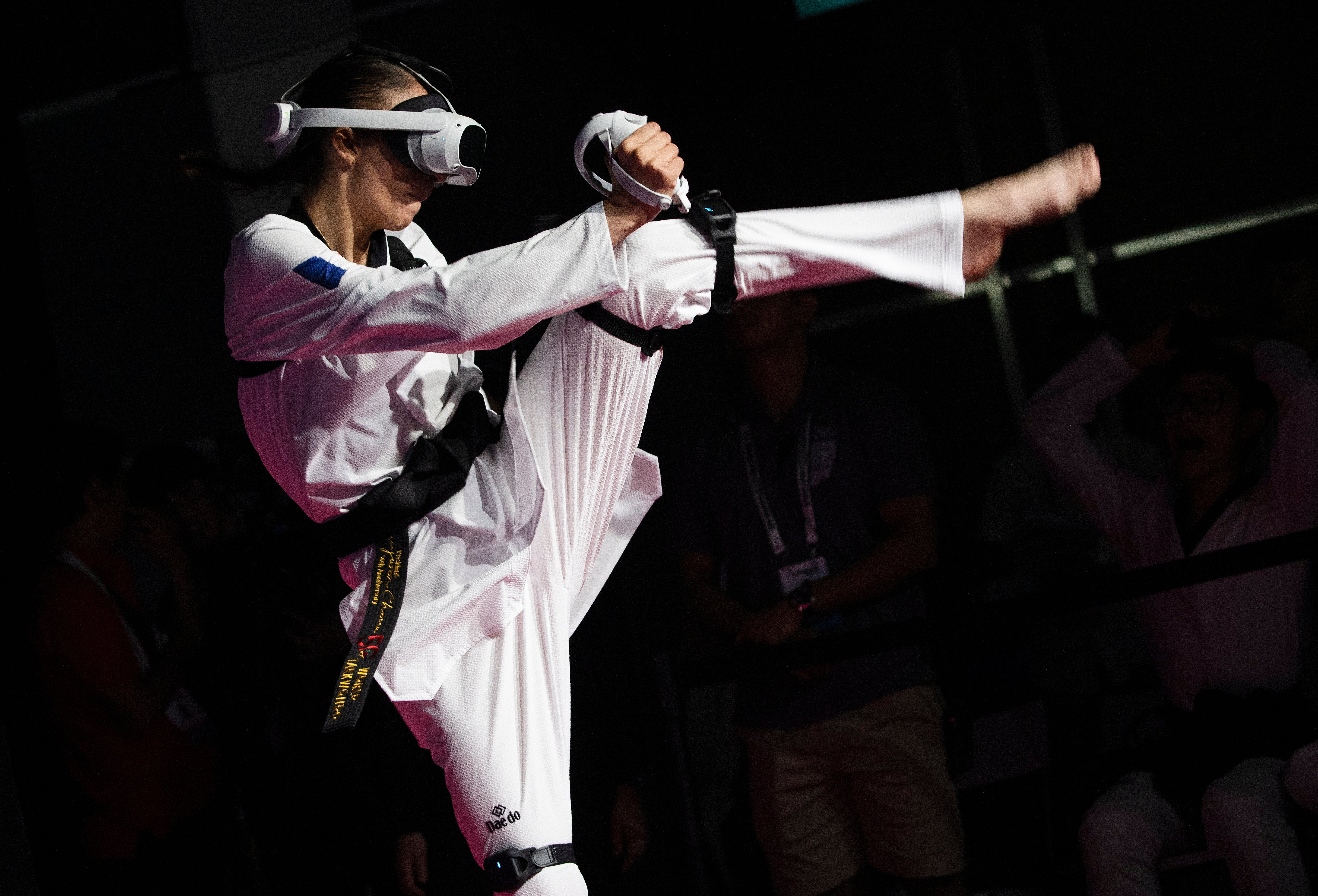 France's Yasmina Aziez competes during round one of the Virtual Taekwondo event of the inaugural Olympic Esports Week in Singapore