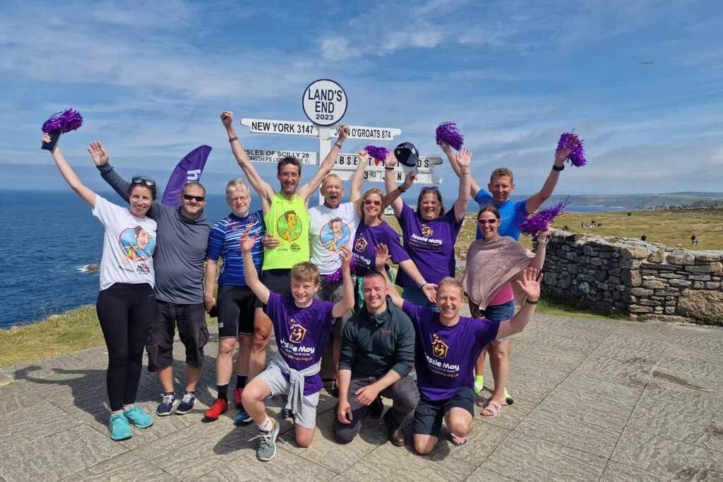 Rob Walker (in yellow) has completed his journey from John O’Groats to Land’s End in memory of four absent friends (Rob Walker)