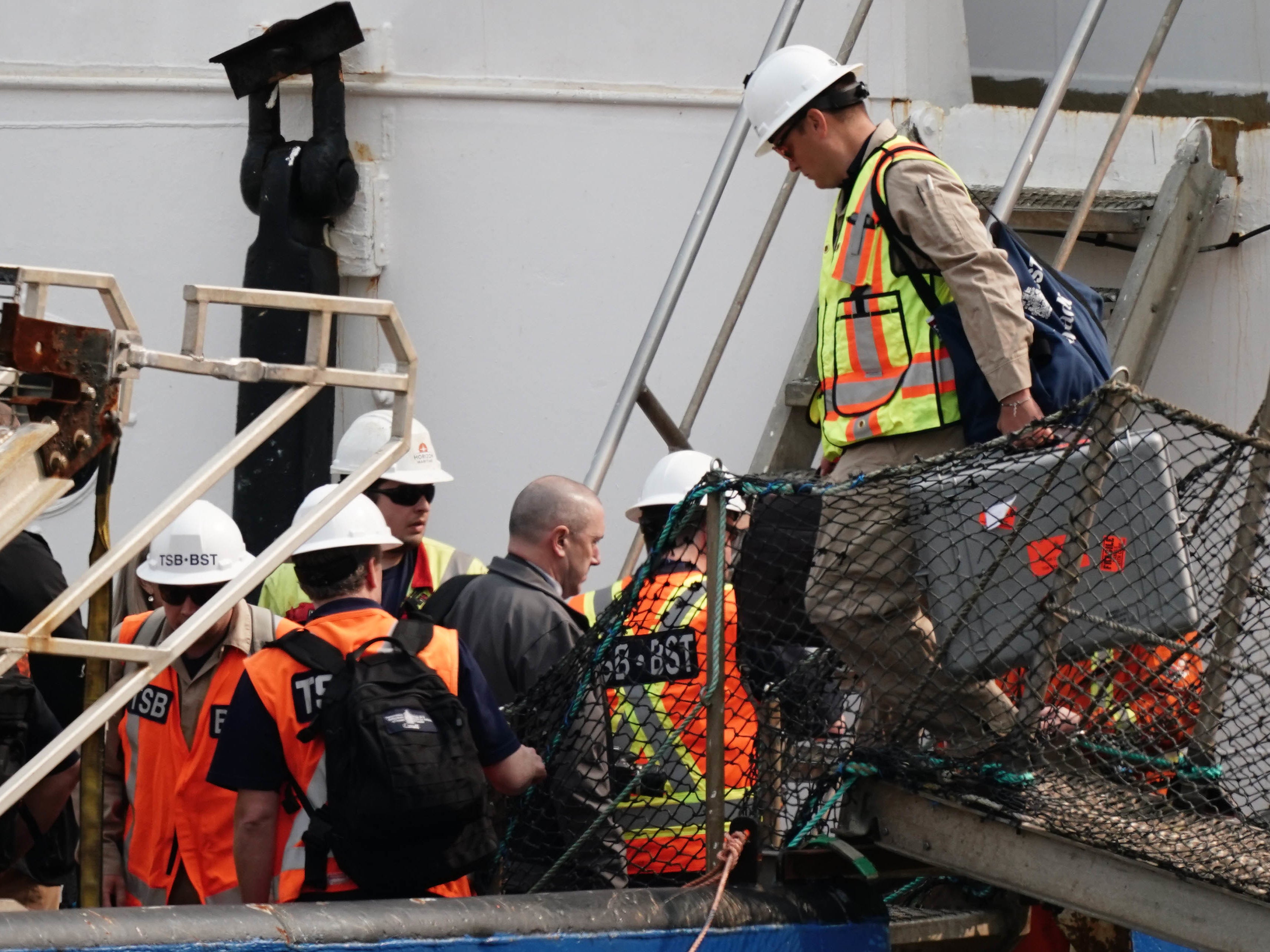 Officials from the Transportation Safety Board (TSB) of Canada board the Polar Prince, the main support ship for the Titan submersible