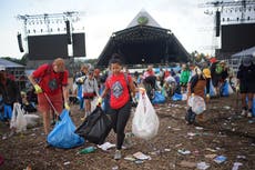 Glastonbury cleanup: revellers put past filth behind them as festival site left better than ever