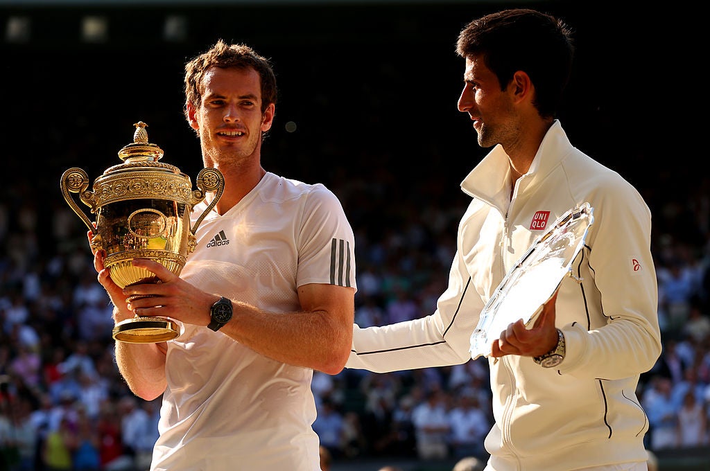 Andy Murray celebrates his first Wimbledon crown in 2013