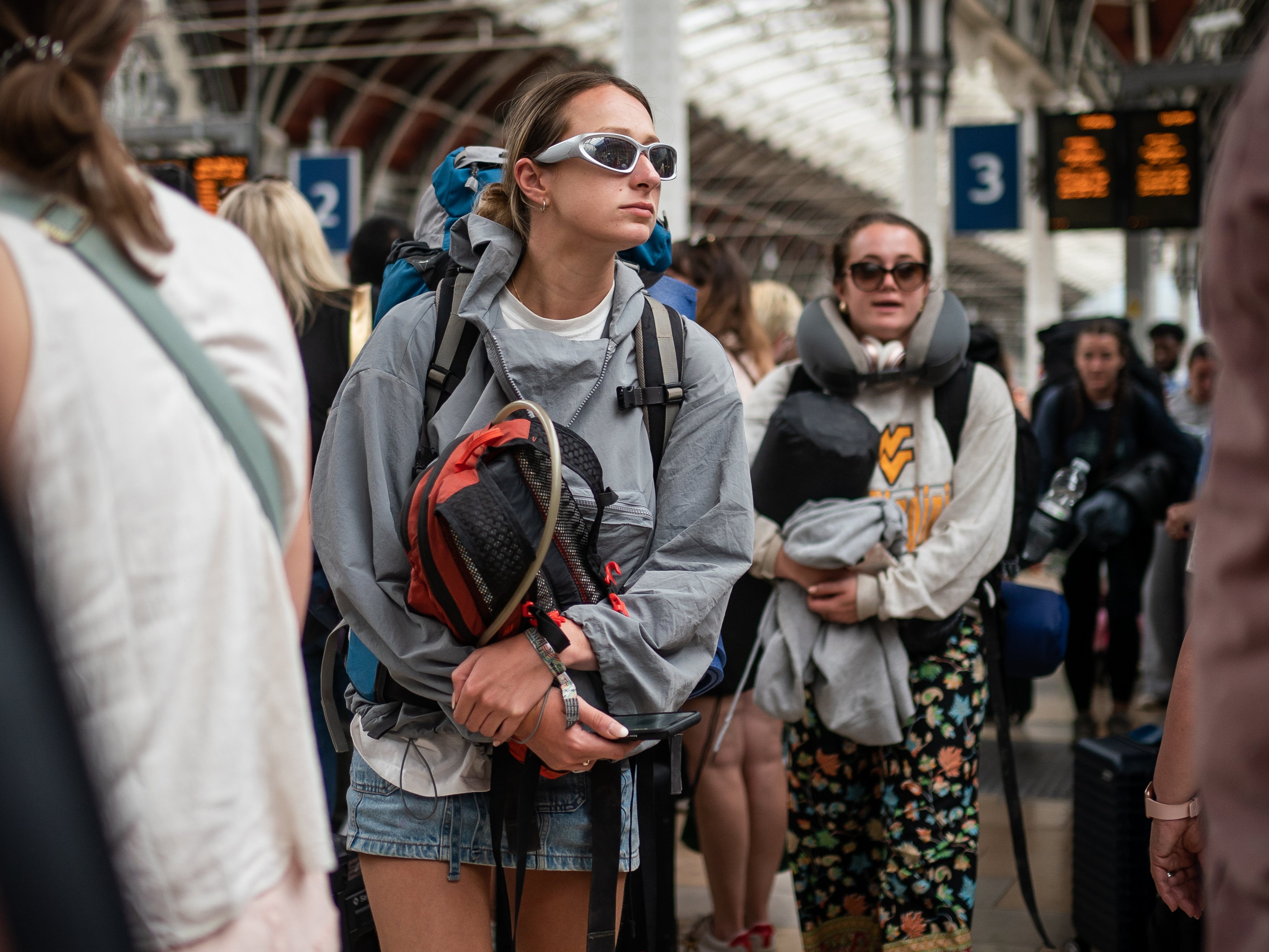 Glastonbury festival goers at Paddington