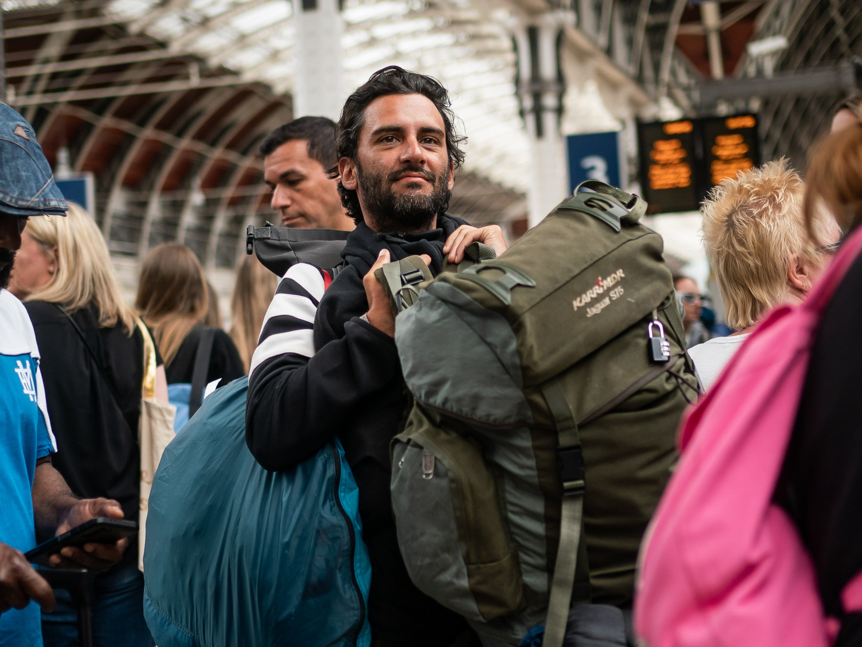 Glastonbury festival goers at Paddington