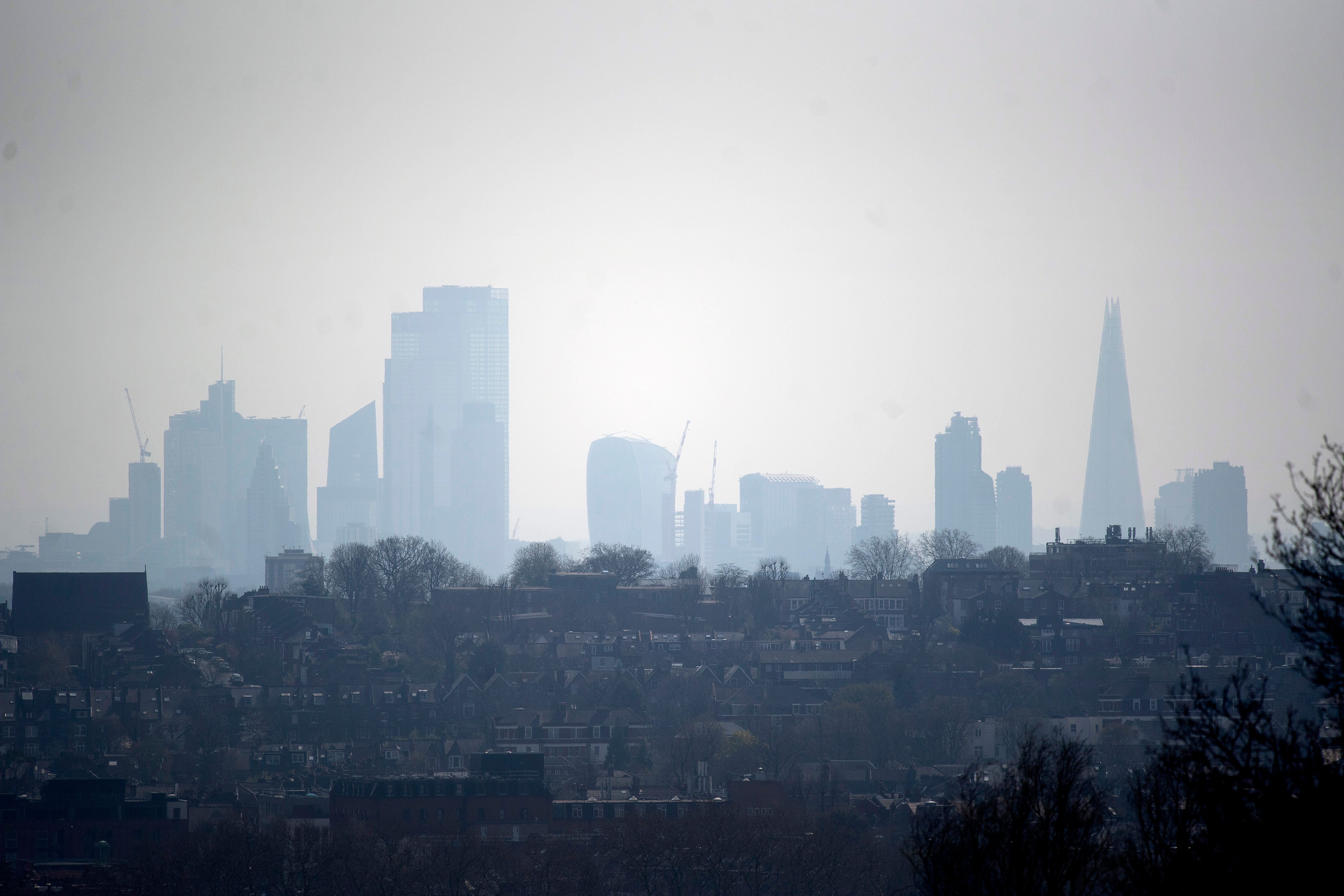 Transport emissions, which contribute to air pollution as well as global warming, are not coming down fast enough, the CCC said (Victoria Jones/PA)