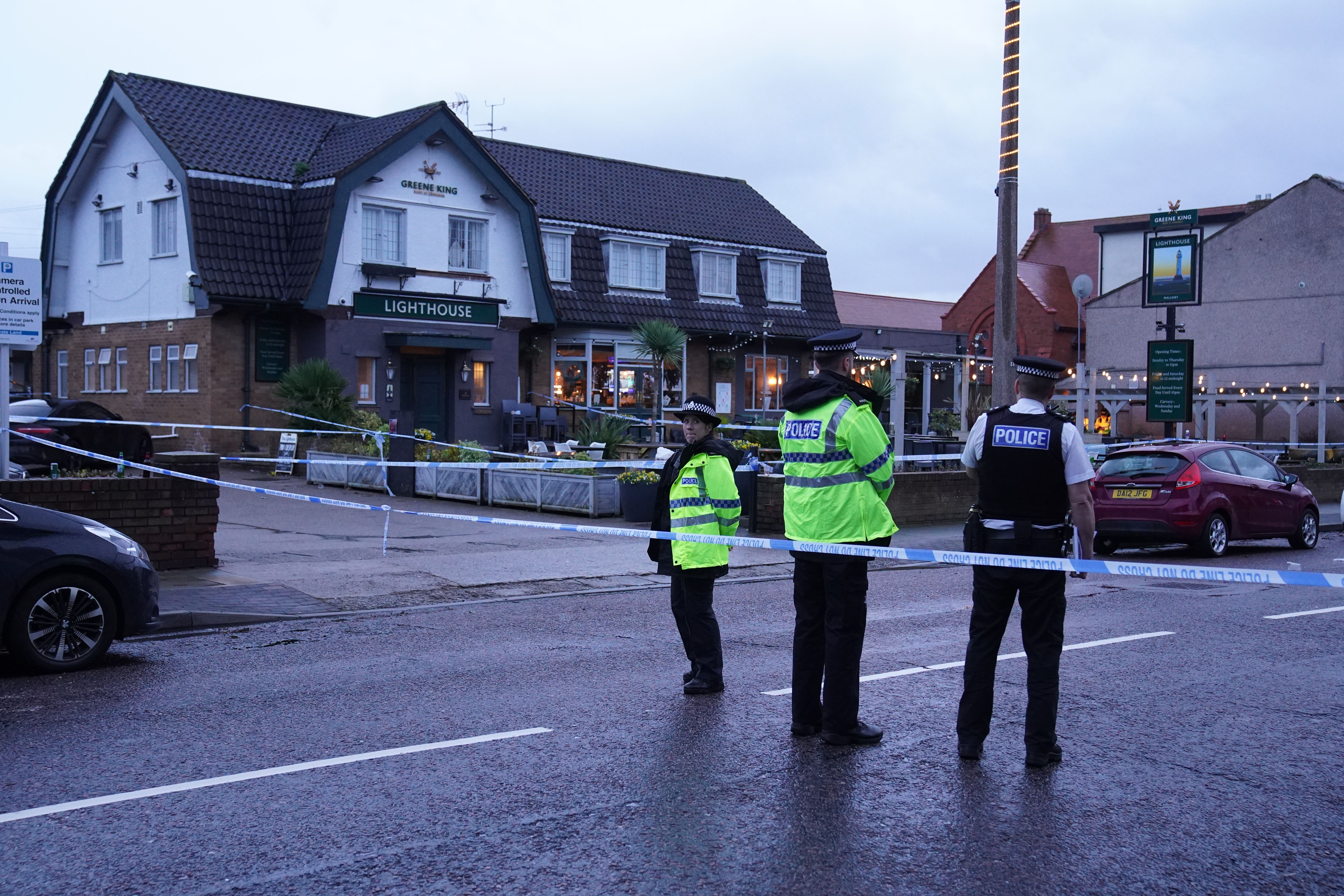 Police officers at the Lighthouse in Wallasey Village, Wirral, after the shooting of Elle Edwards (Peter Byrne/PA)