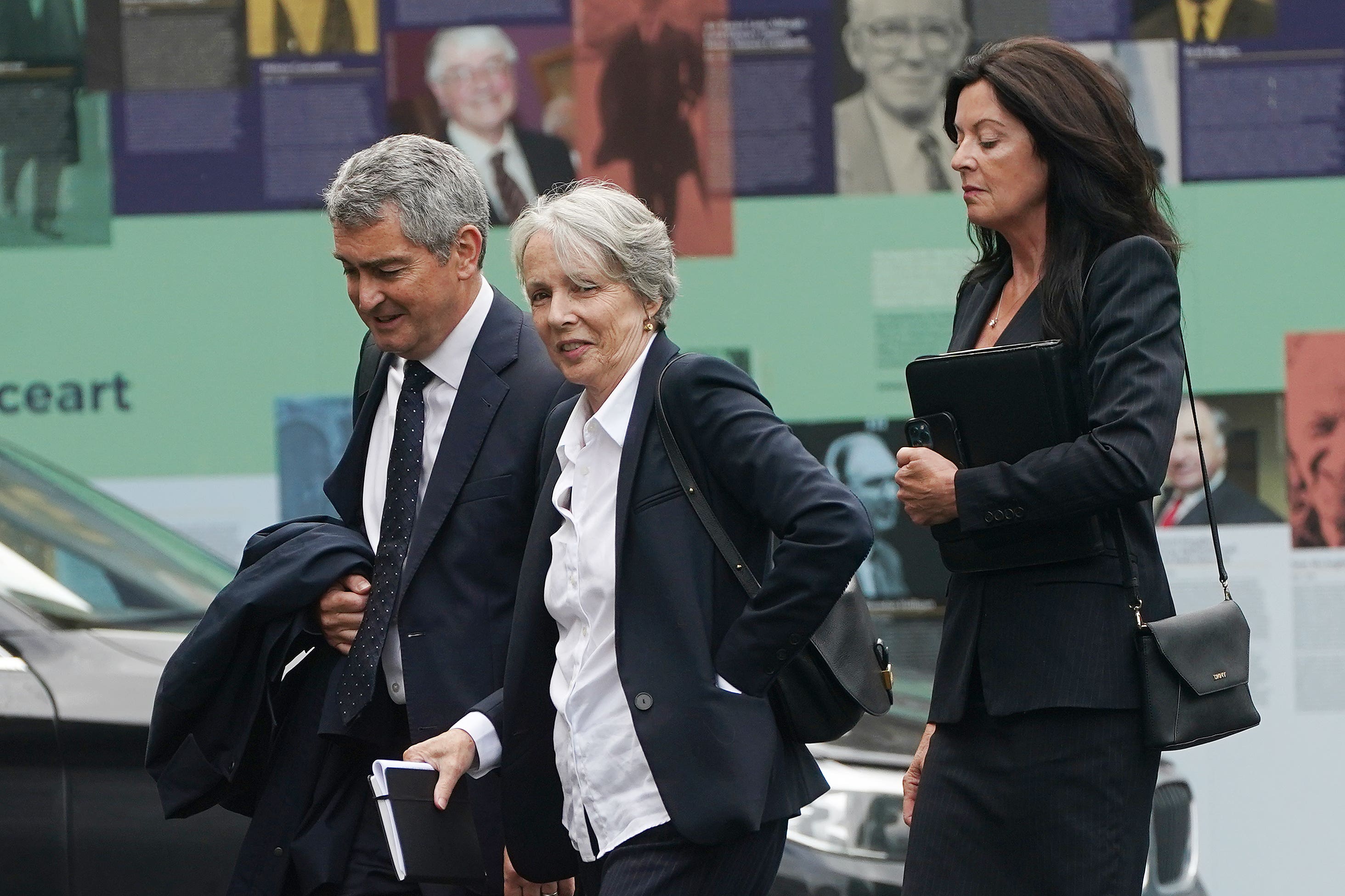 RTE chair of the board Siun Ni Raghallaigh, centre, addressed the committee on Wednesday (Brian Lawless/PA)