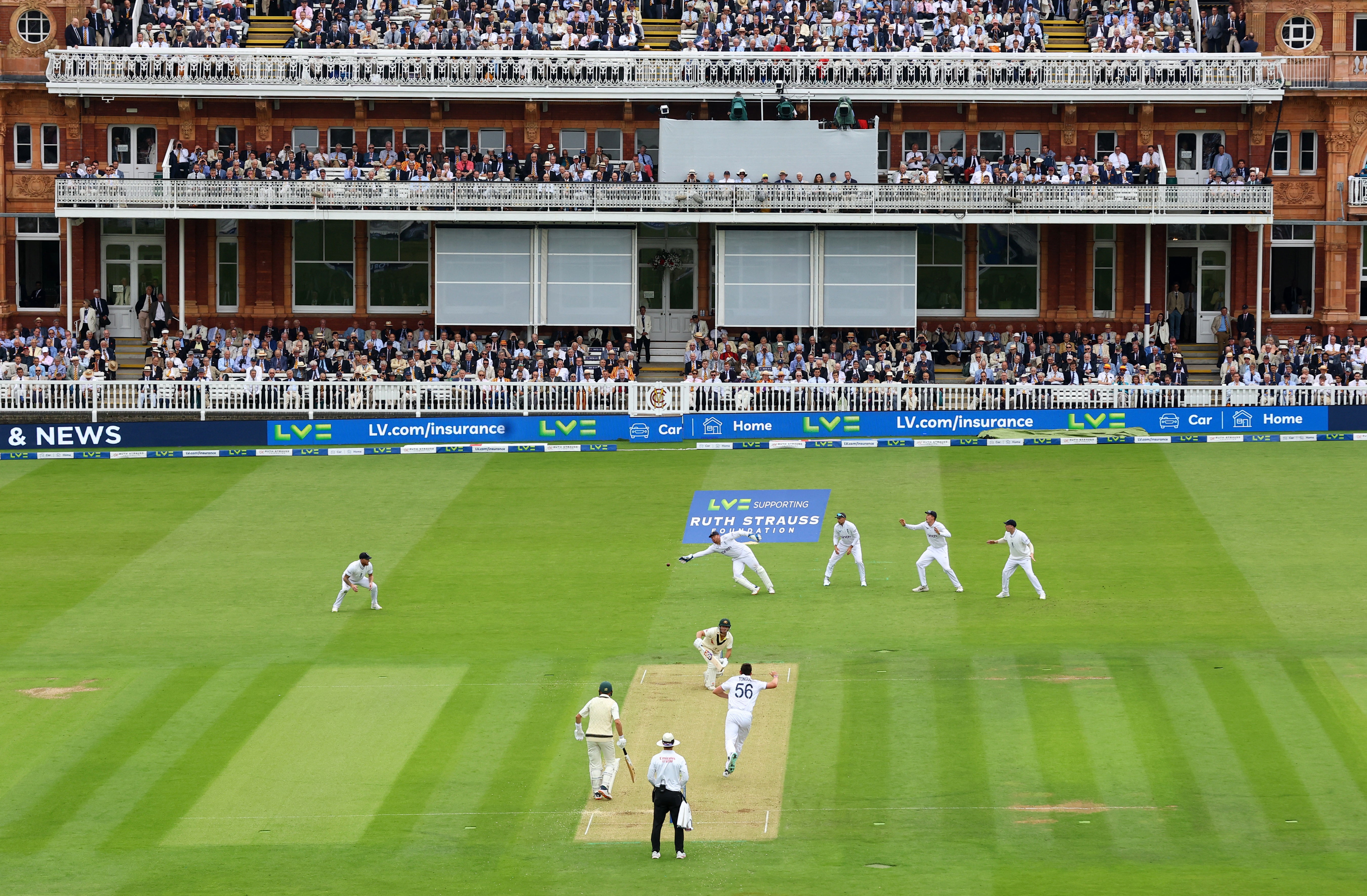 England’s Jonny Bairstow dives as he attempts to field a ball at Lord’s