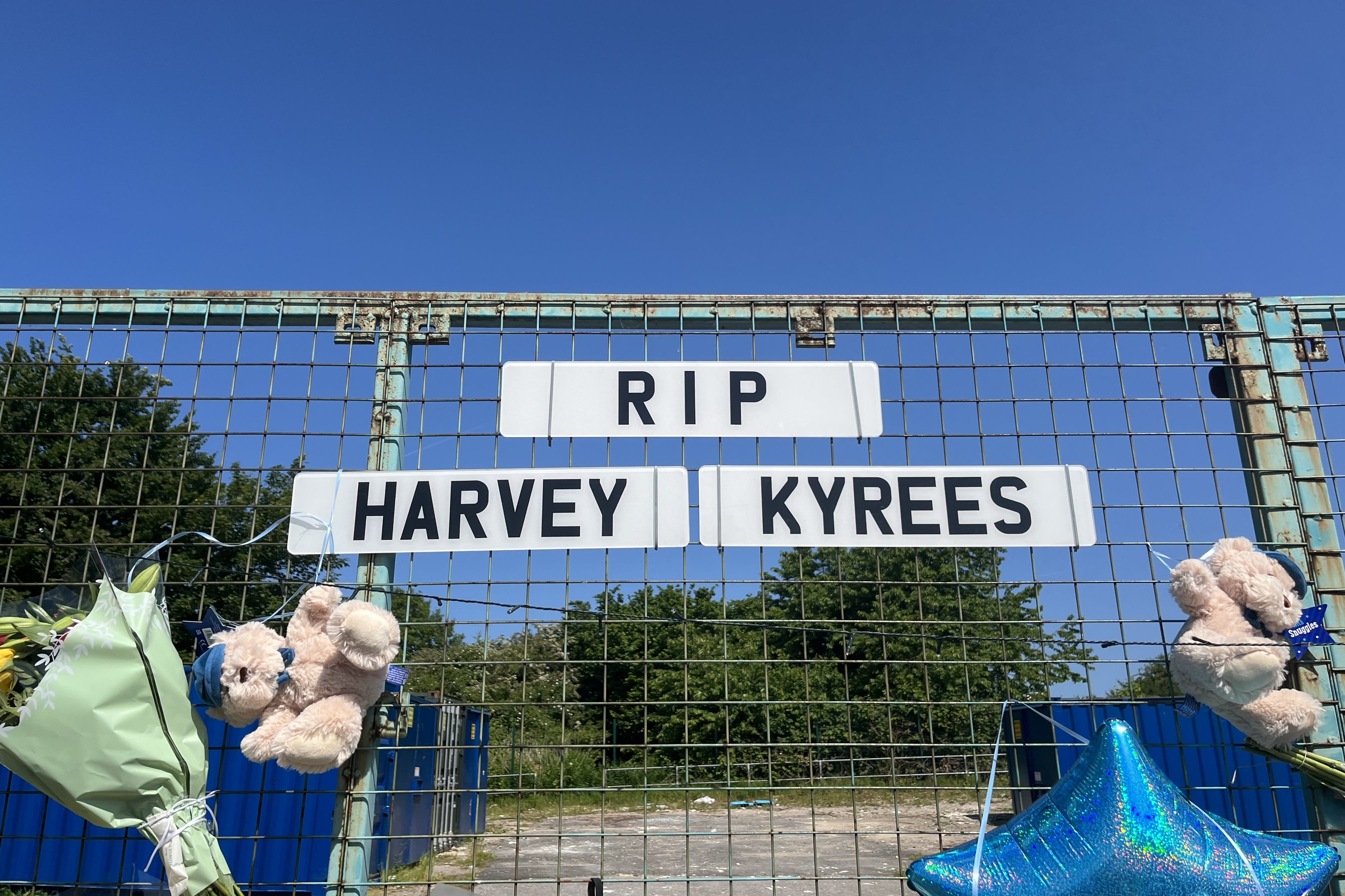 Floral tributes left to Kyrees Sullivan and Harvey Evans on Snowden Road, Ely (Rod Minchin/PA)