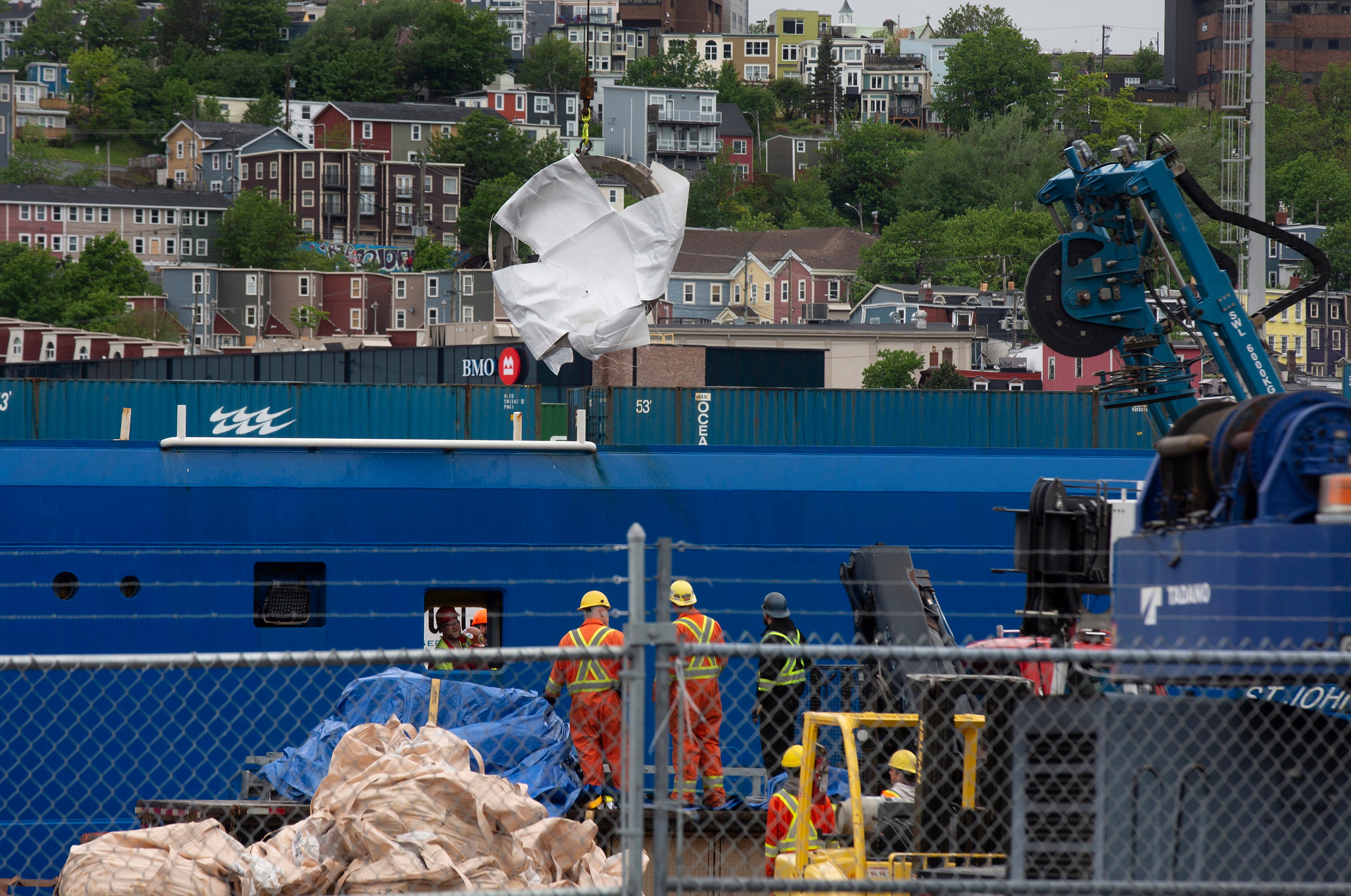 Debris from the Titan submersible, recovered from the ocean floor near the wreck of the Titanic, is unloaded from the ship Horizon Arctic at the Canadian Coast Guard pier in St. John's, Newfoundland