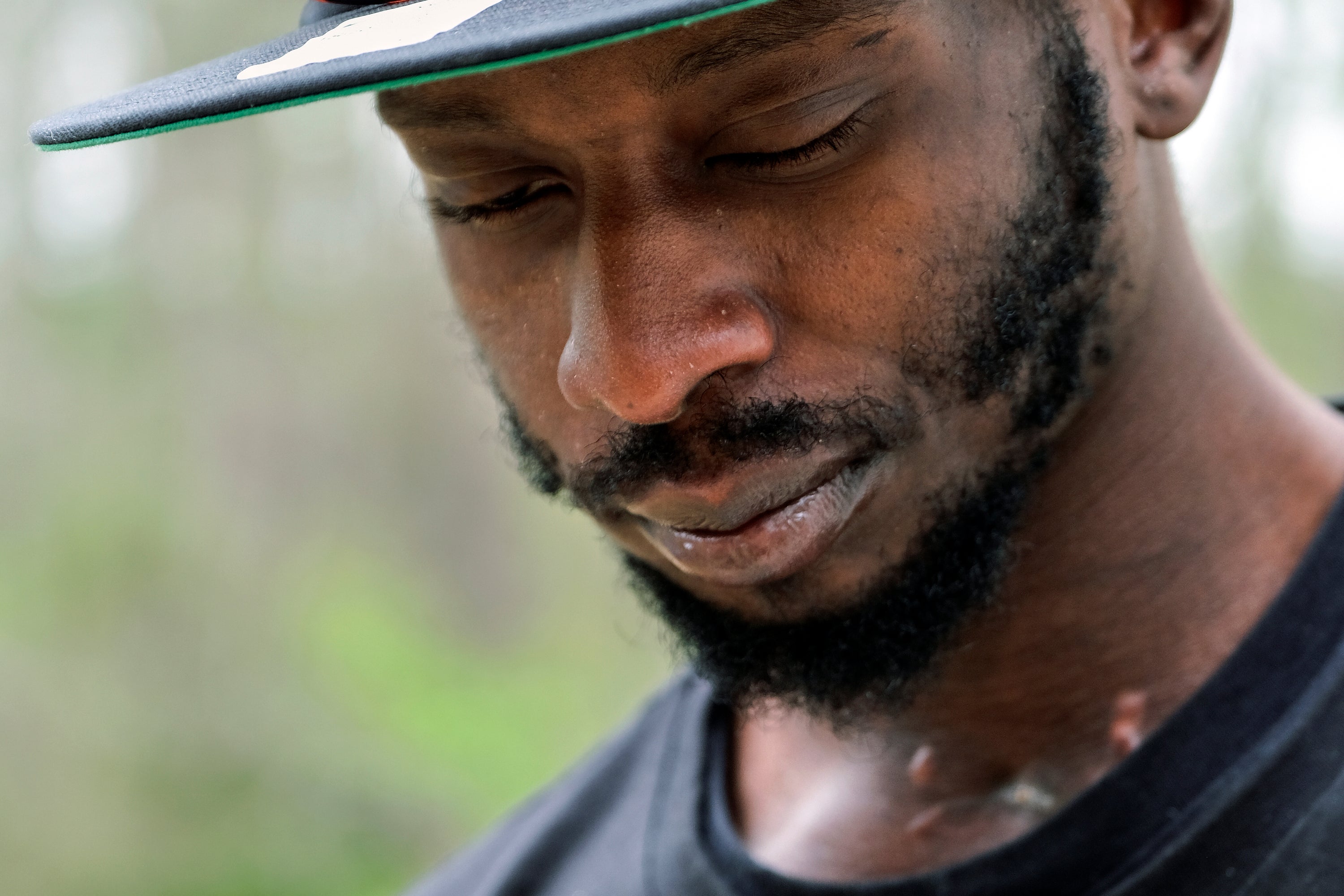 Michael Corey Jenkins stands outside Taylor Hill Church in Braxton, Miss., March 18, 2023.