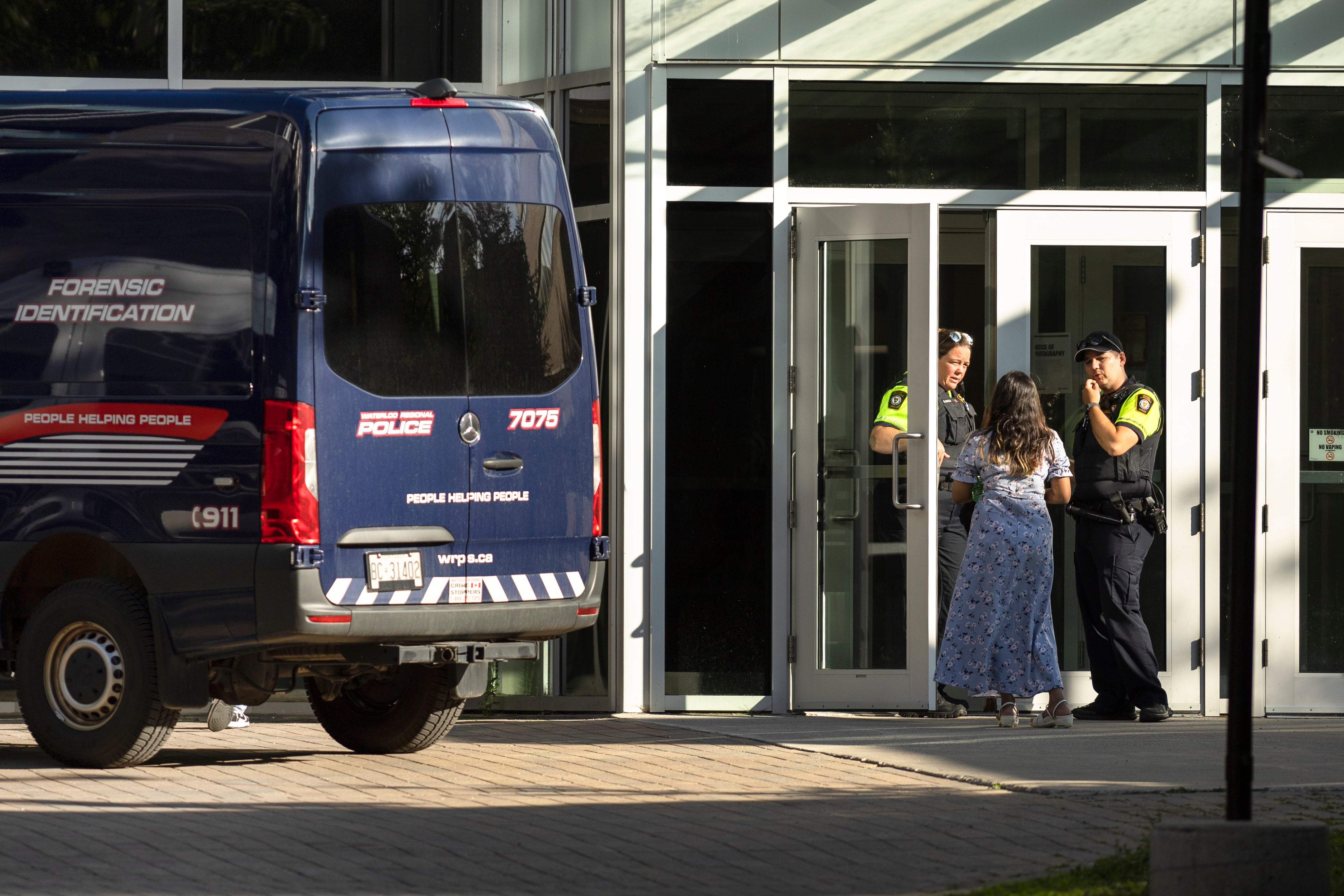 Members of the Waterloo Regional Police investigate a stabbing at the University of Waterloo, in Waterloo, Ontario, Wednesday, June 28, 2023.