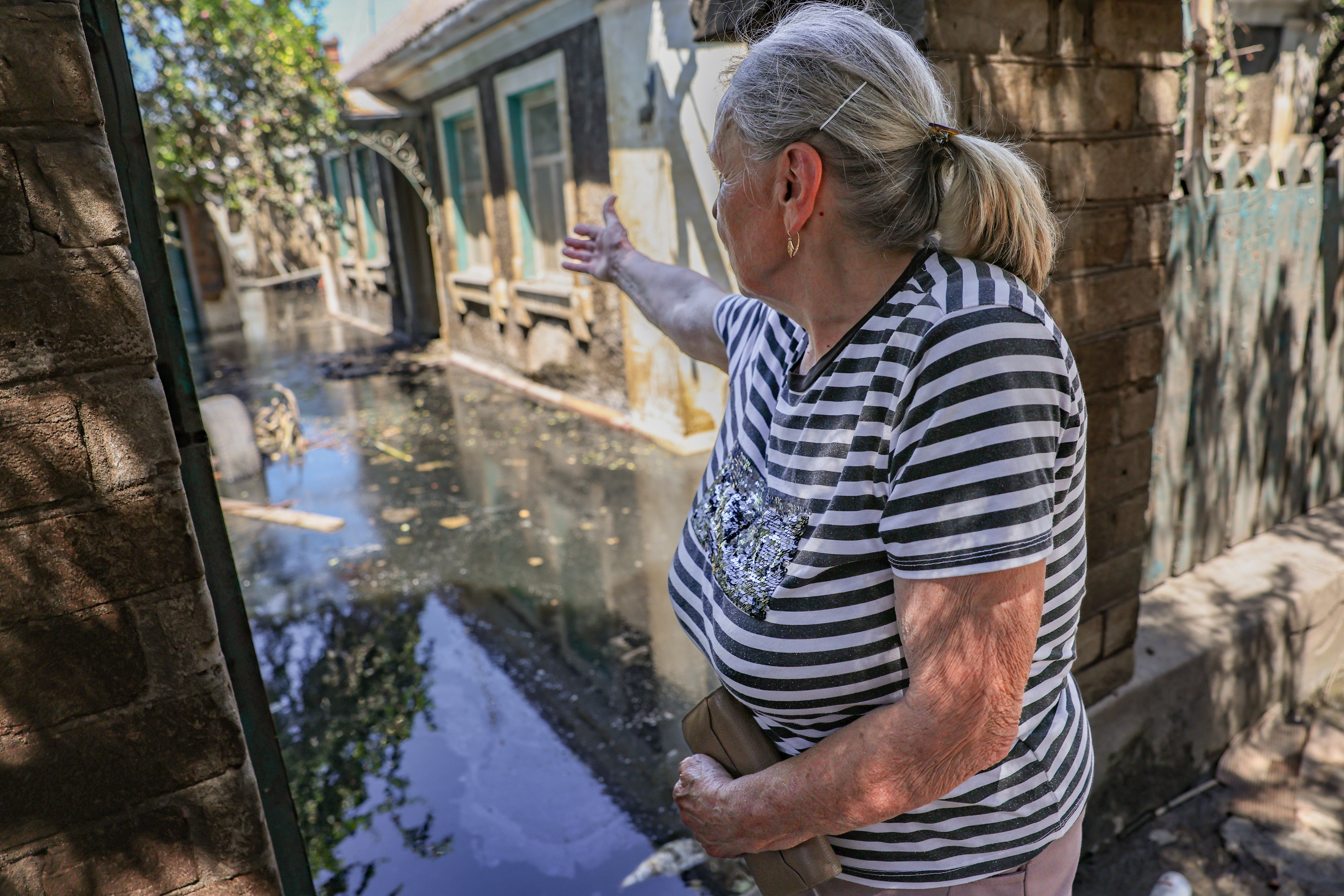 Anna, 73, says there is nothing left of homes in the heavily shelled city of Kherson, even after the waters recede