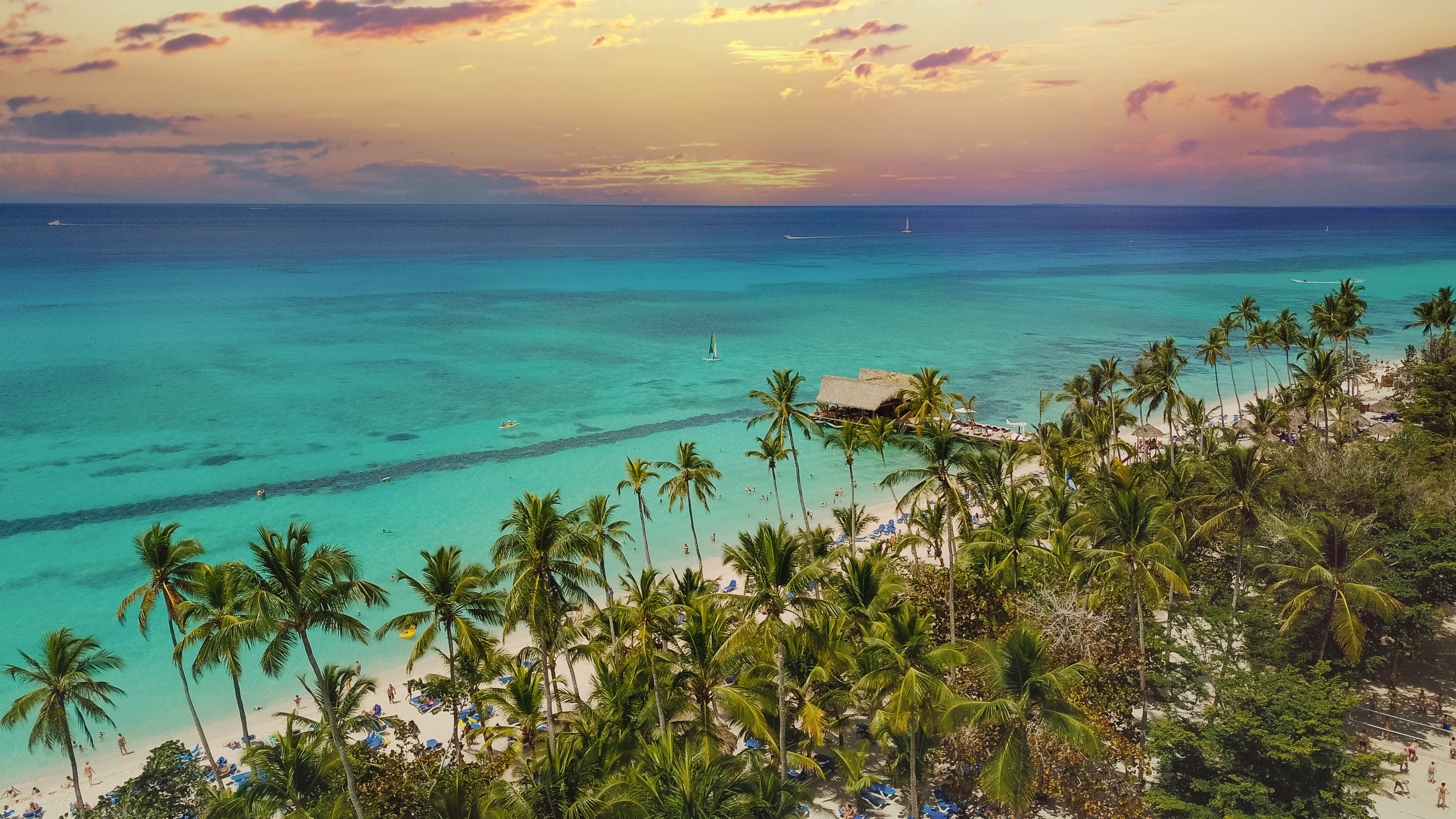 Palm fringed beaches line the Caribbean island’s coast