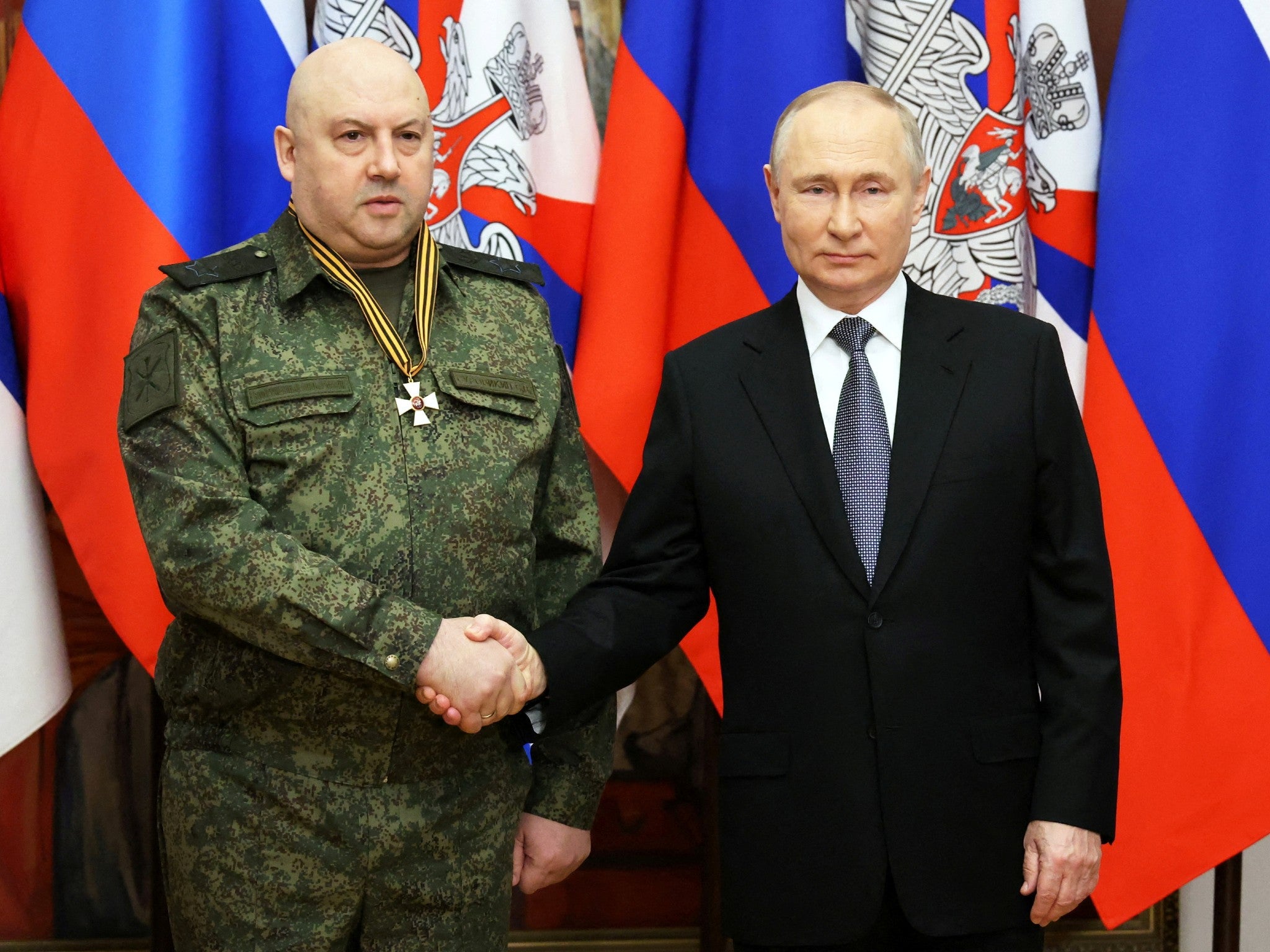 Russian president Vladimir Putin awards a medal to Sergei Surovikin last December