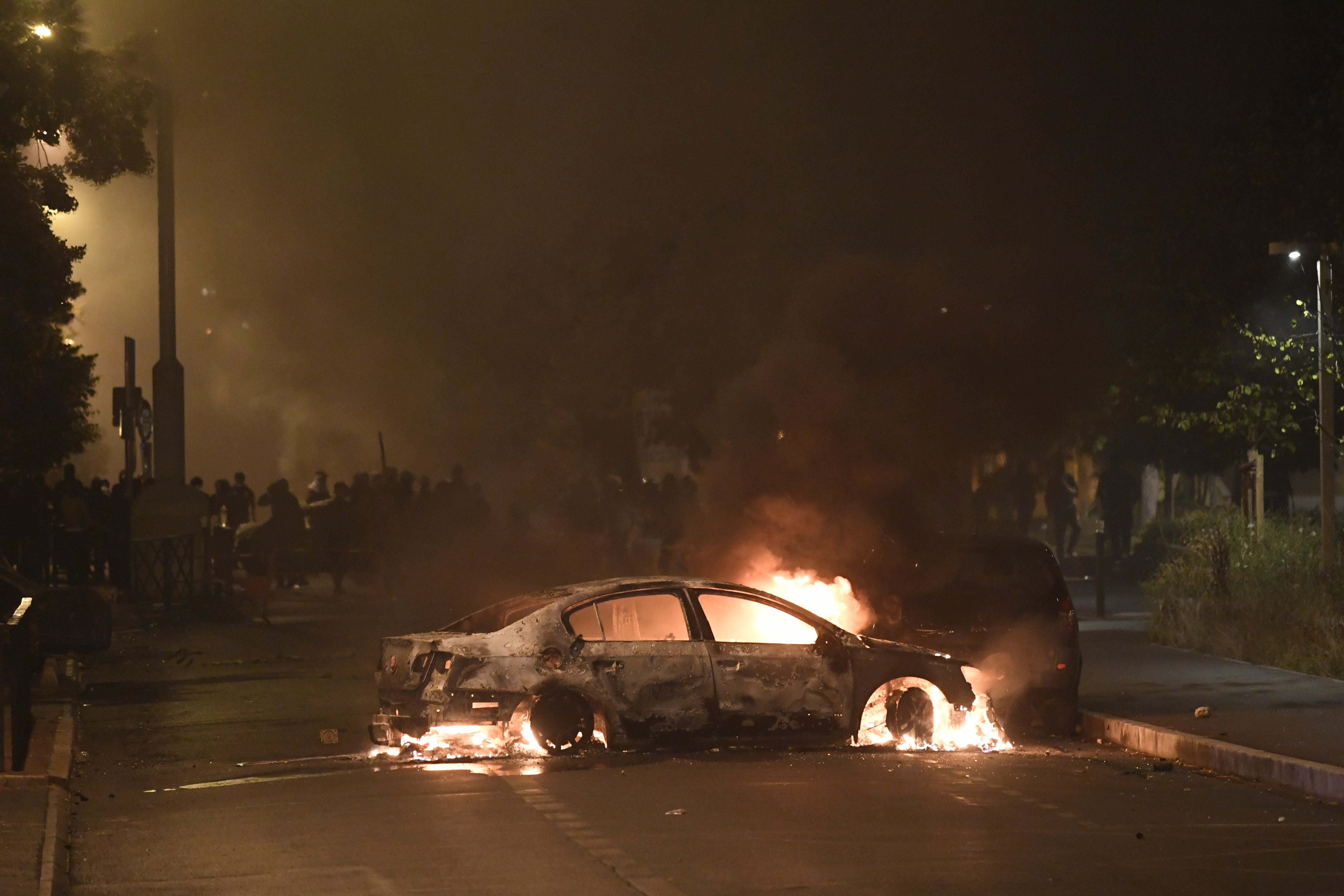 Protesters clash with riot police in Nanterre, near Paris