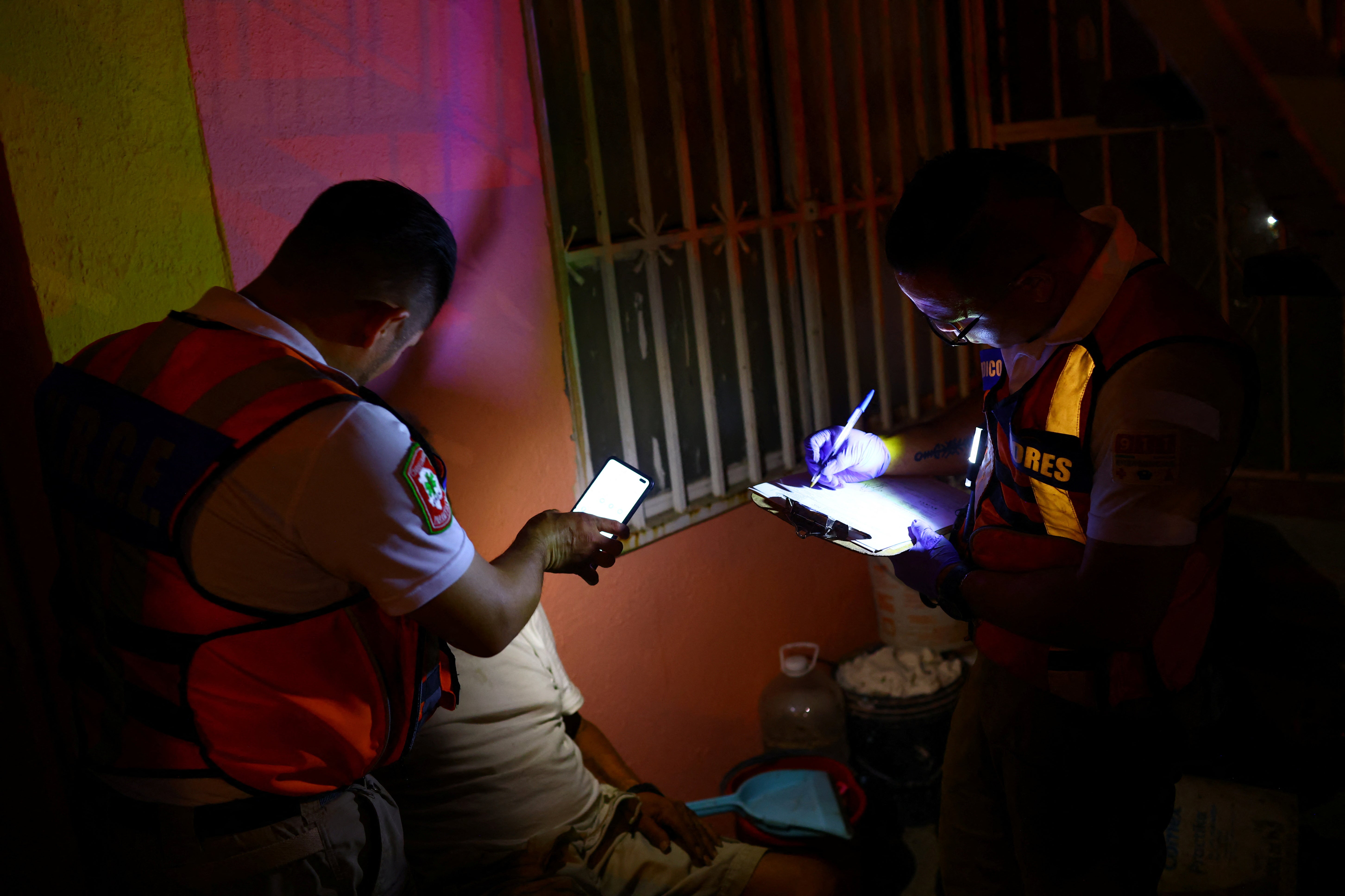 Paramedics treat an older person with symptoms of dehydration during a day of high temperatures, in Ciudad Juarez, Mexico on June 27, 2023