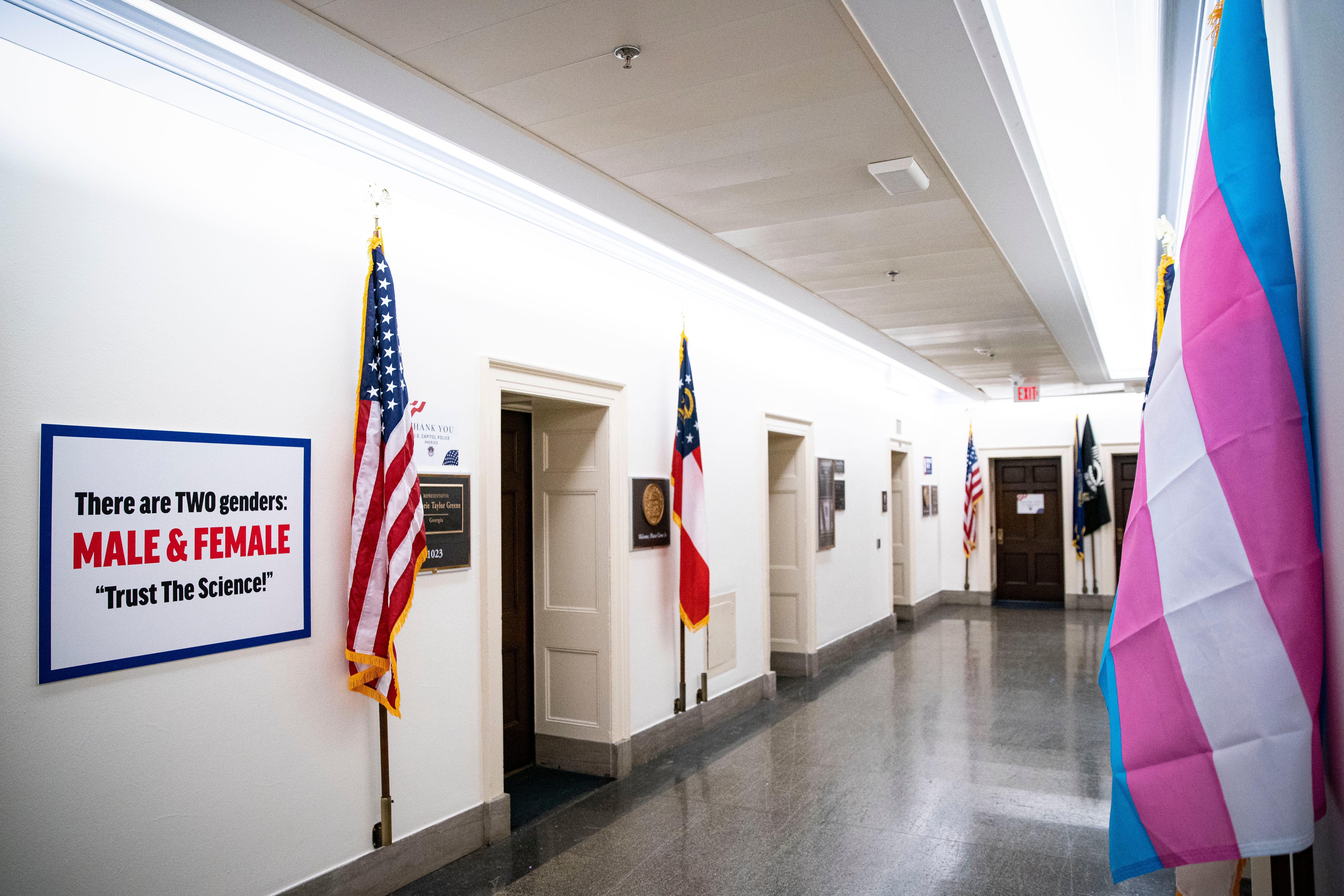 US Rep Marjorie Taylor Greene posted a sign outside her office in response to a Transgender Pride flag outside the office of then-US Rep Marie Newman, whose daughter is trans, in 2021.