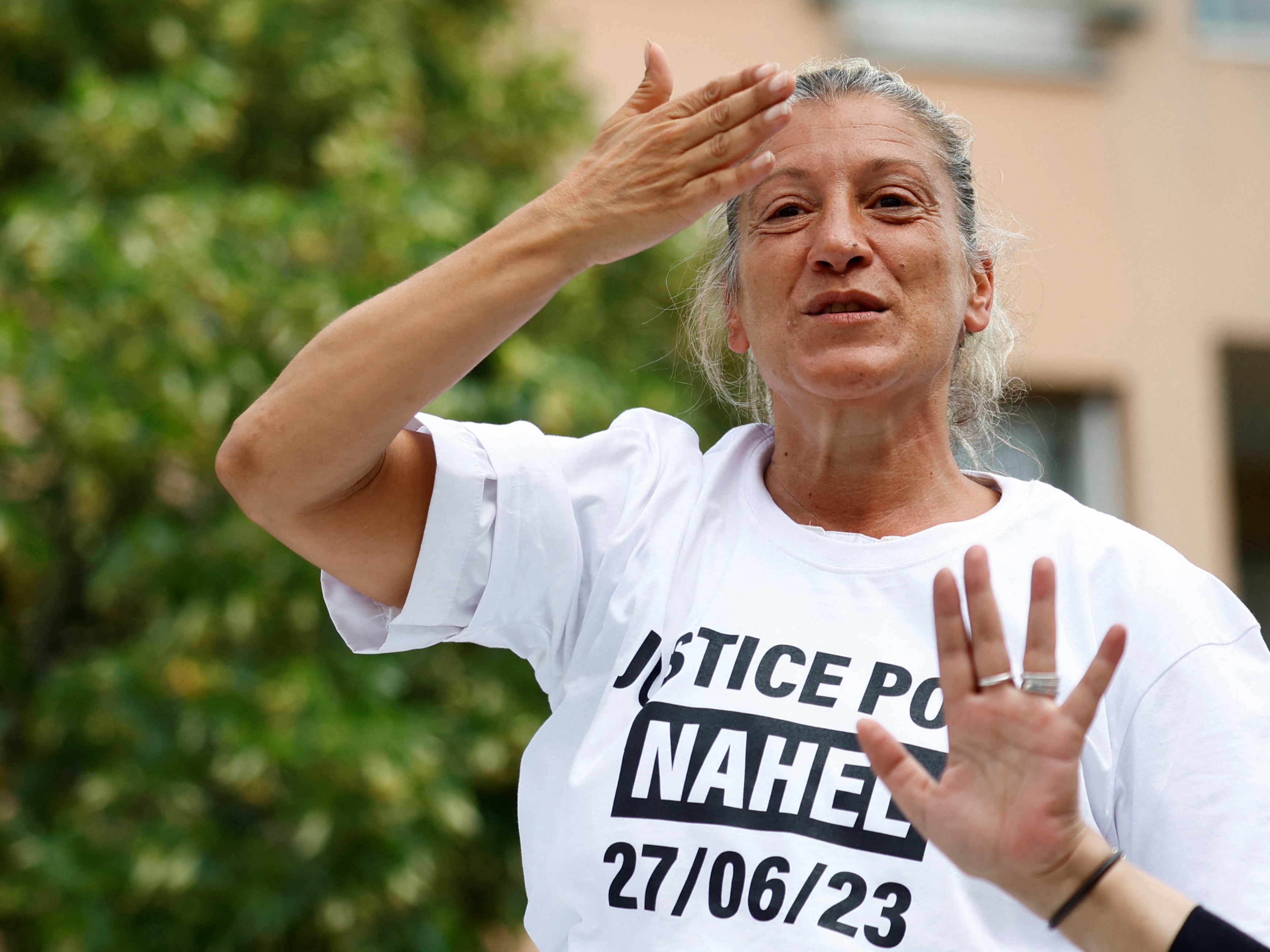 Mother Mounia attended a march in tribute to her son in Nanterre