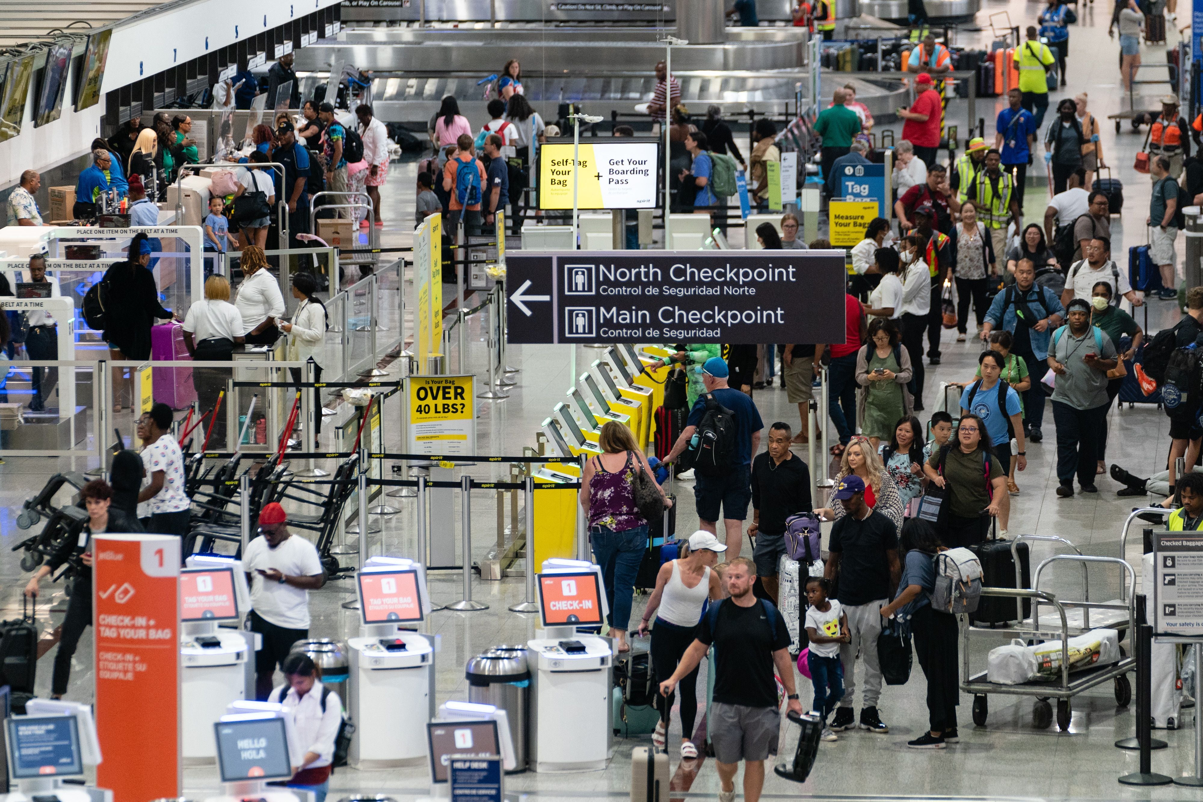 Travelers are seen ahead of the Fourth of July holiday weekend at Hartsfield-Jackson Atlanta International Airport