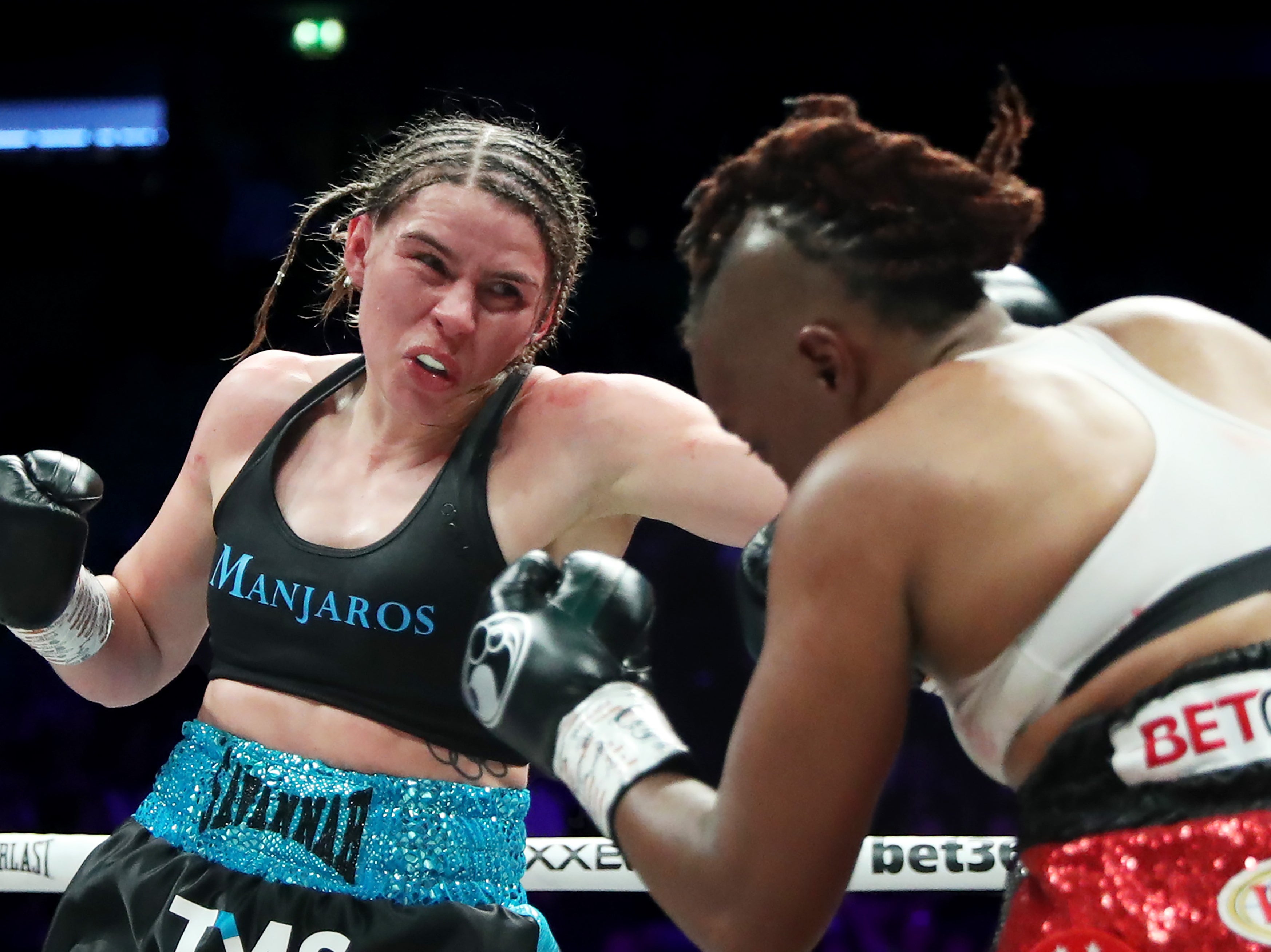 Marshall (left) bounced back from a loss to Claressa Shields to win the super-middleweight belts