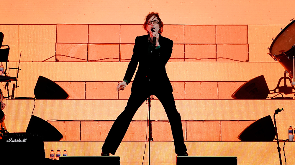 Jarvis Cocker, frontman of Pulp, on stage in 2023