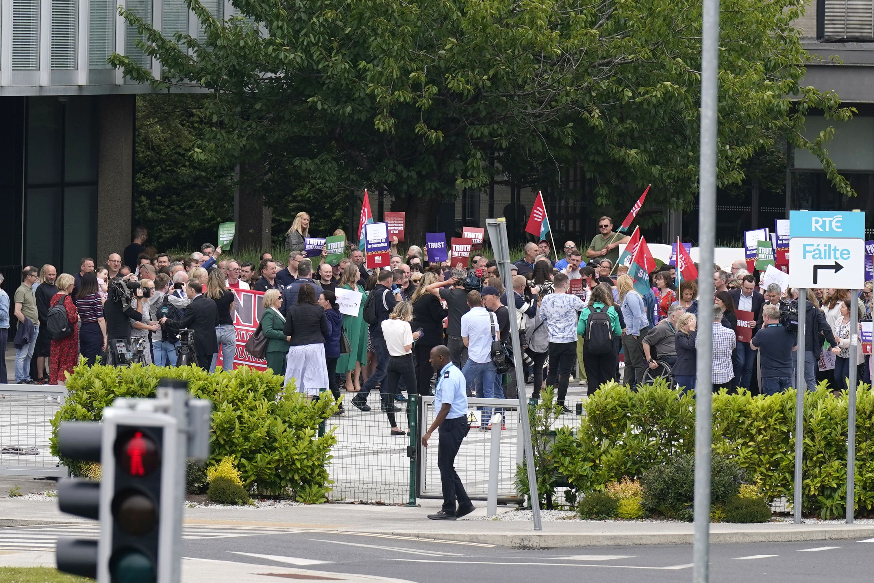 Members of staff from RTE take part in a protest at the broadcaster’s headquarters in Donnybrook, Dublin, in response to growing anger and a call for answers amid the spiralling controversy at the public service broadcaster (Niall Carson/PA)