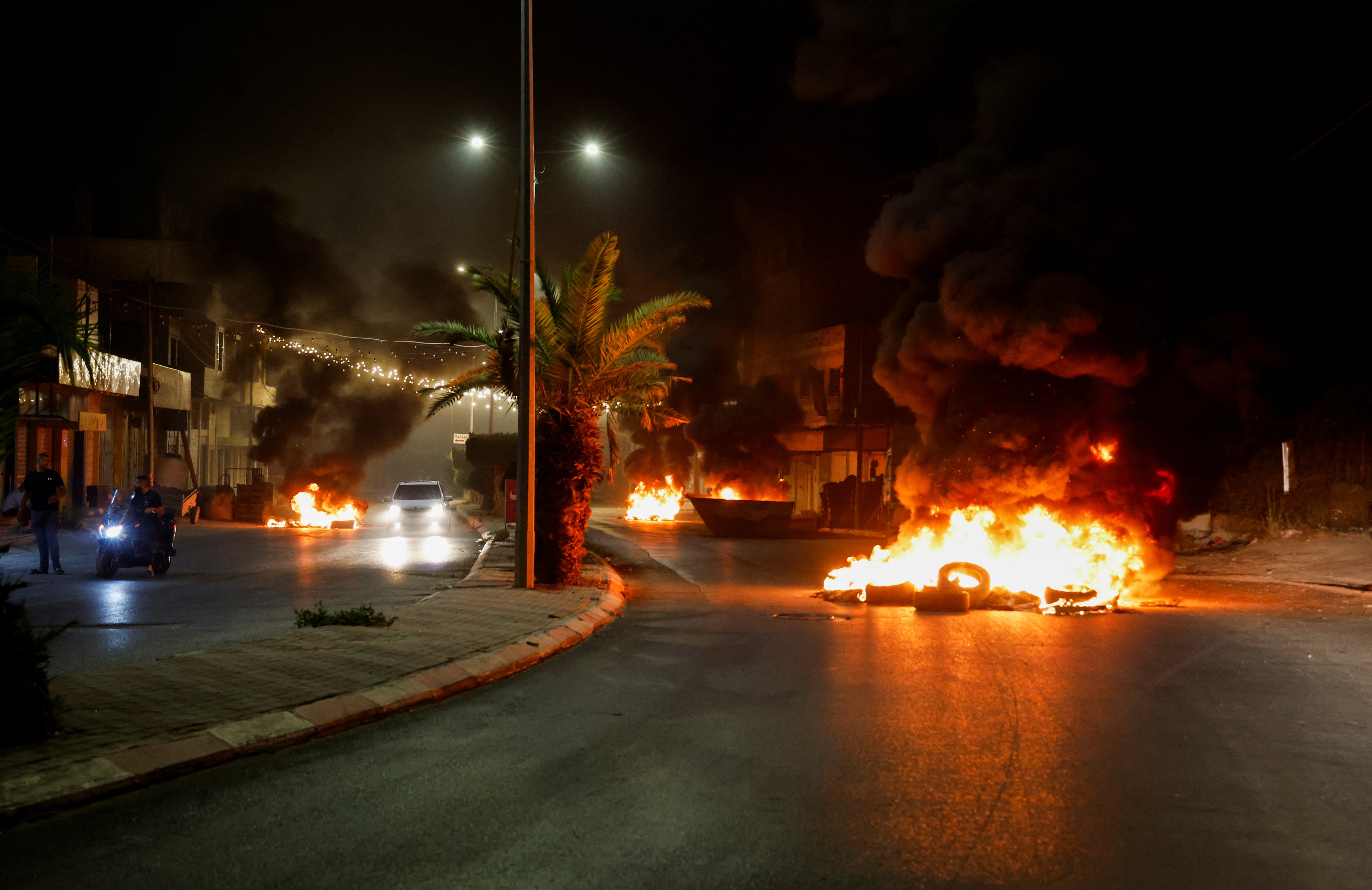 Palestinians protest against the invasion