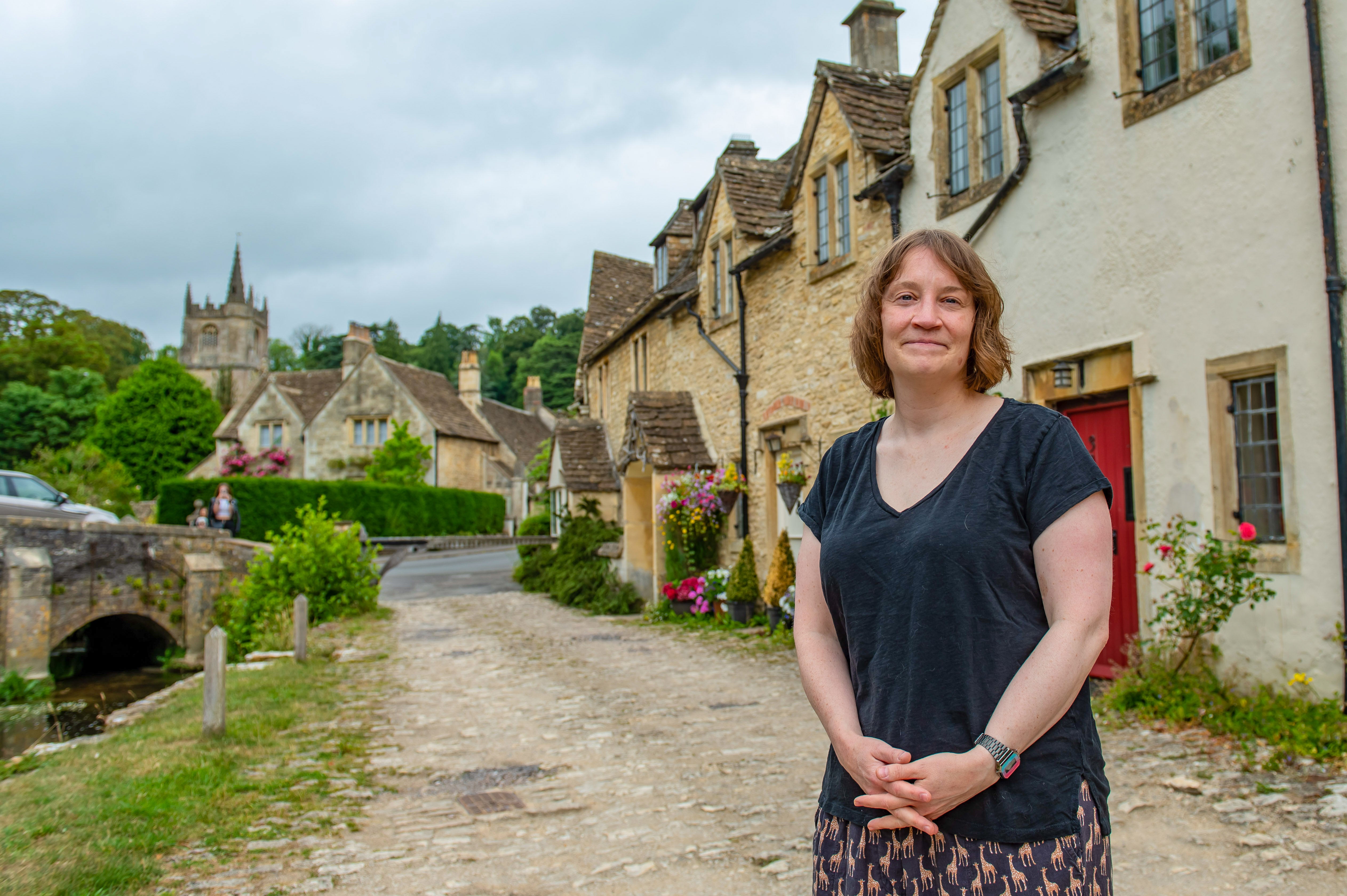 Georgina Kingshot outside her home in Castle Combe