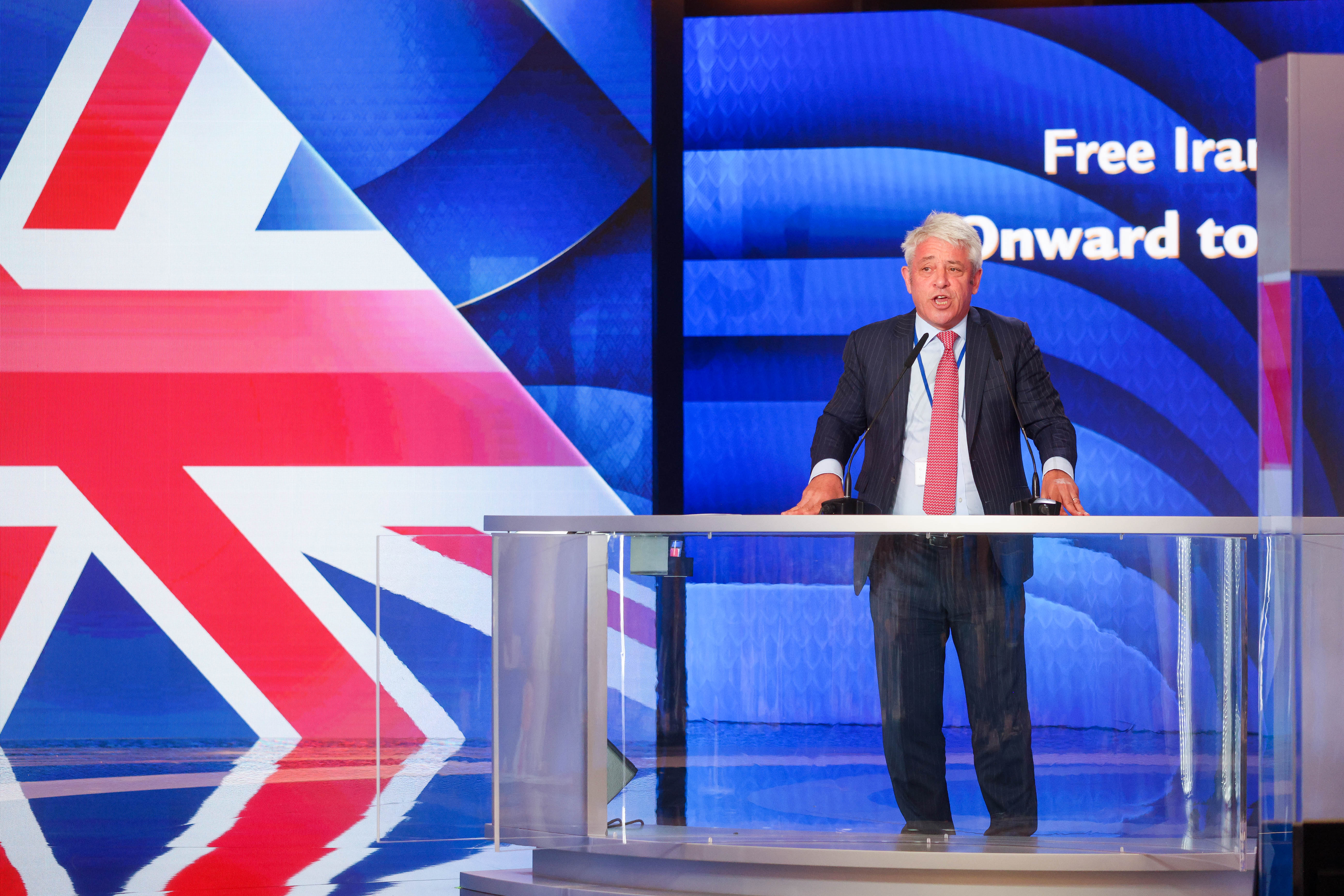 Former House of Commons speaker John Bercow delivers remarks at the 2023 NCRI Free Iran summit in Paris