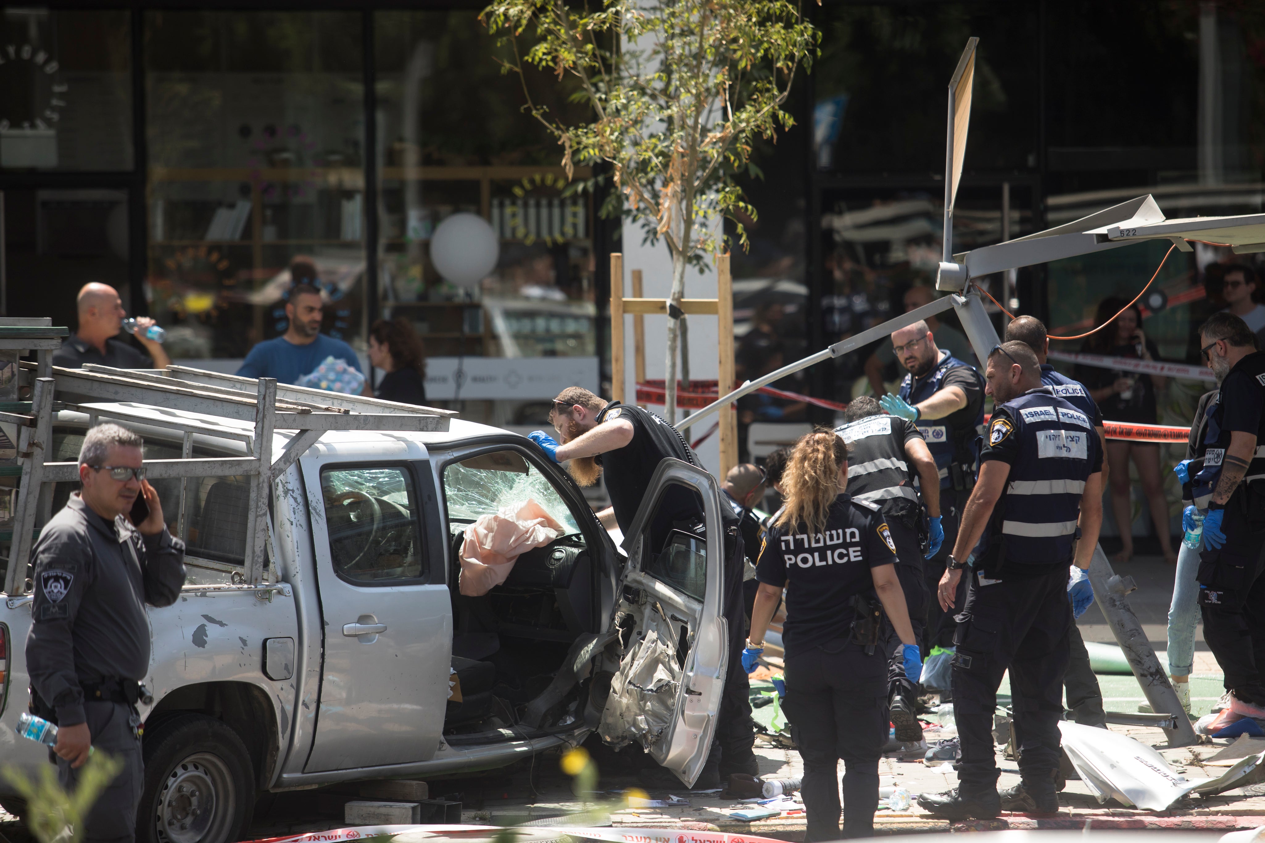 Eight people were injured after a car rammed into pedestrians, the driver then stabbed several people before being neutralised