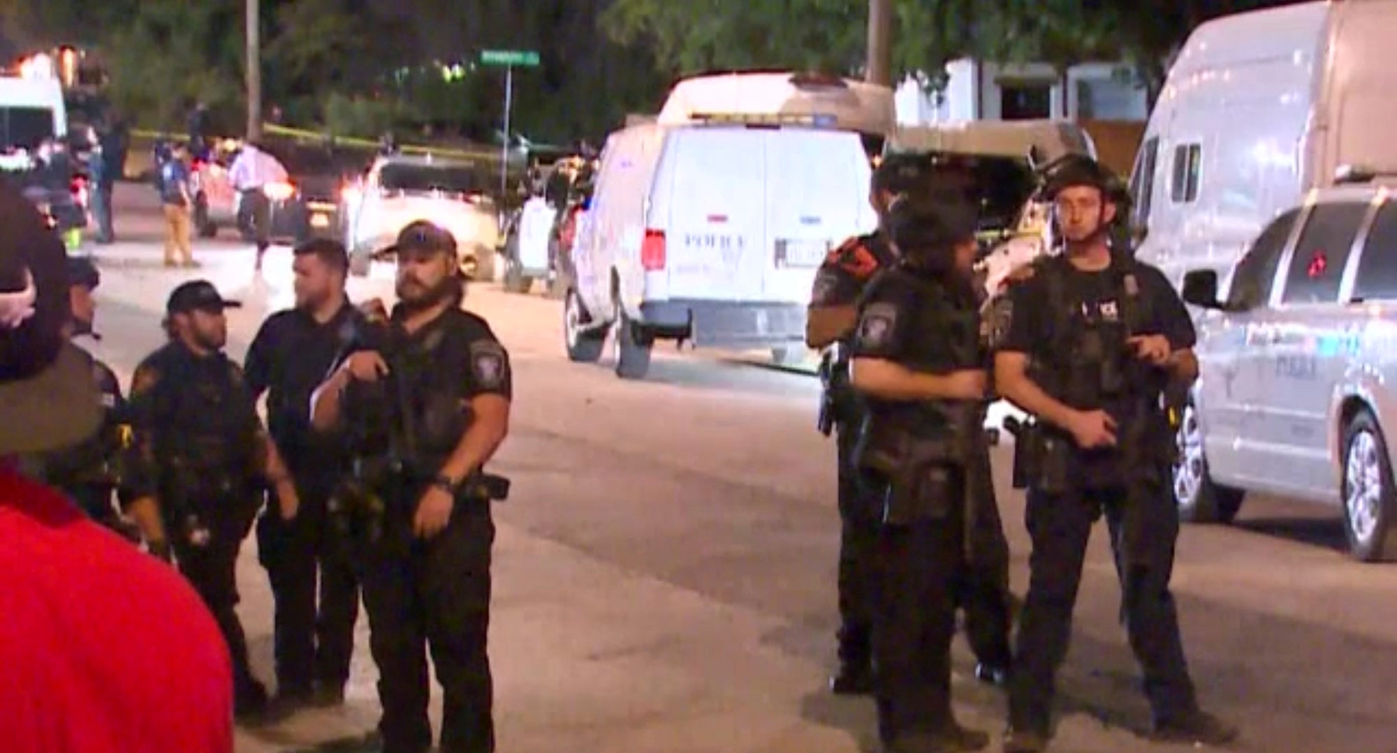 Police arrive on the scene of a deadly shooting late Monday, July 3, 2023 in Forth Worth, Texas. Authorities say gunfire erupted following a local festival in the Como neighborhood in the city's southwest. (WFAA via AP)