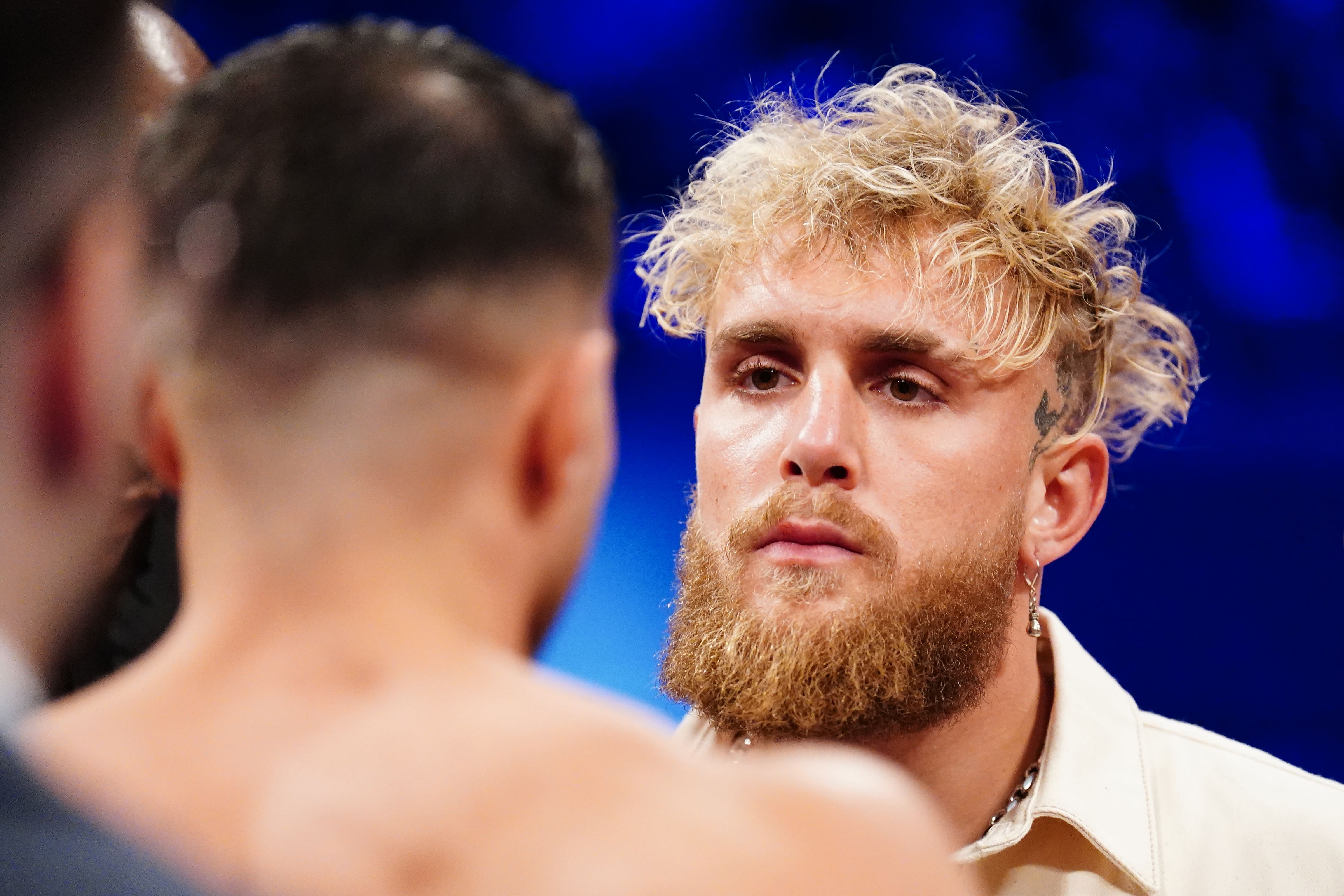 Jake Paul and Tommy Fury face off in the ring at the OVO Arena, Wembley (PA)