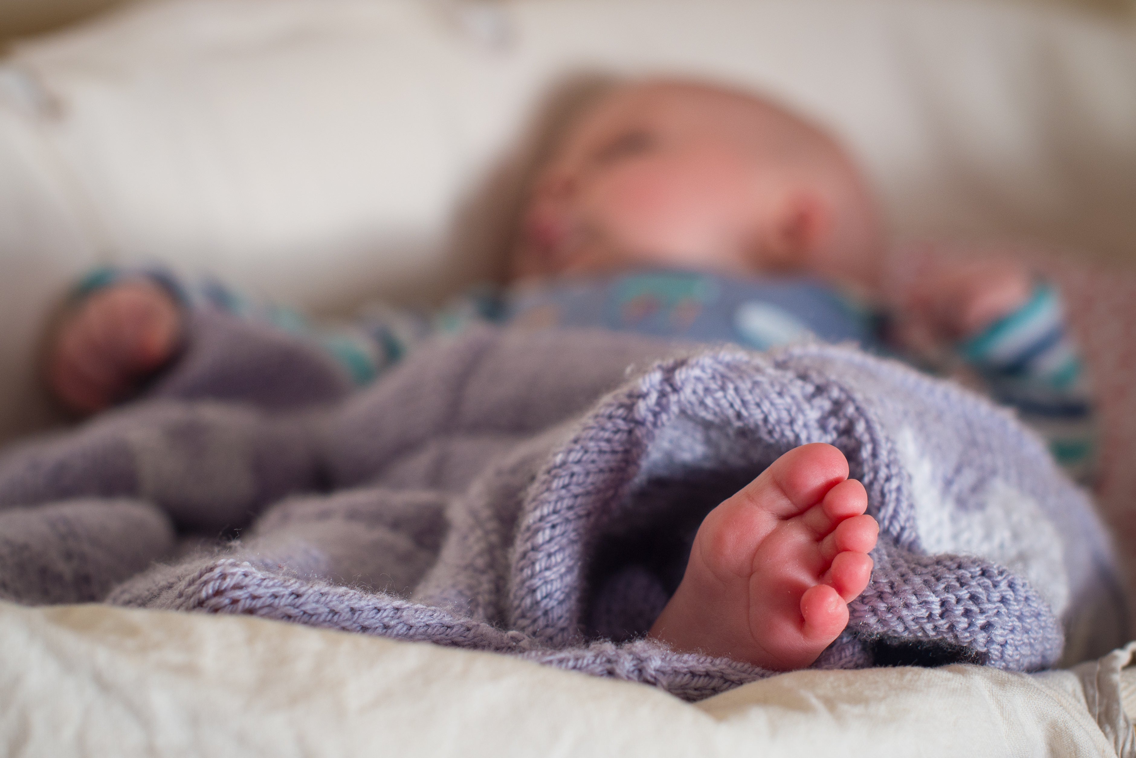 A baby sleeping in a basket as a record number of original names were issued in Scotland last year