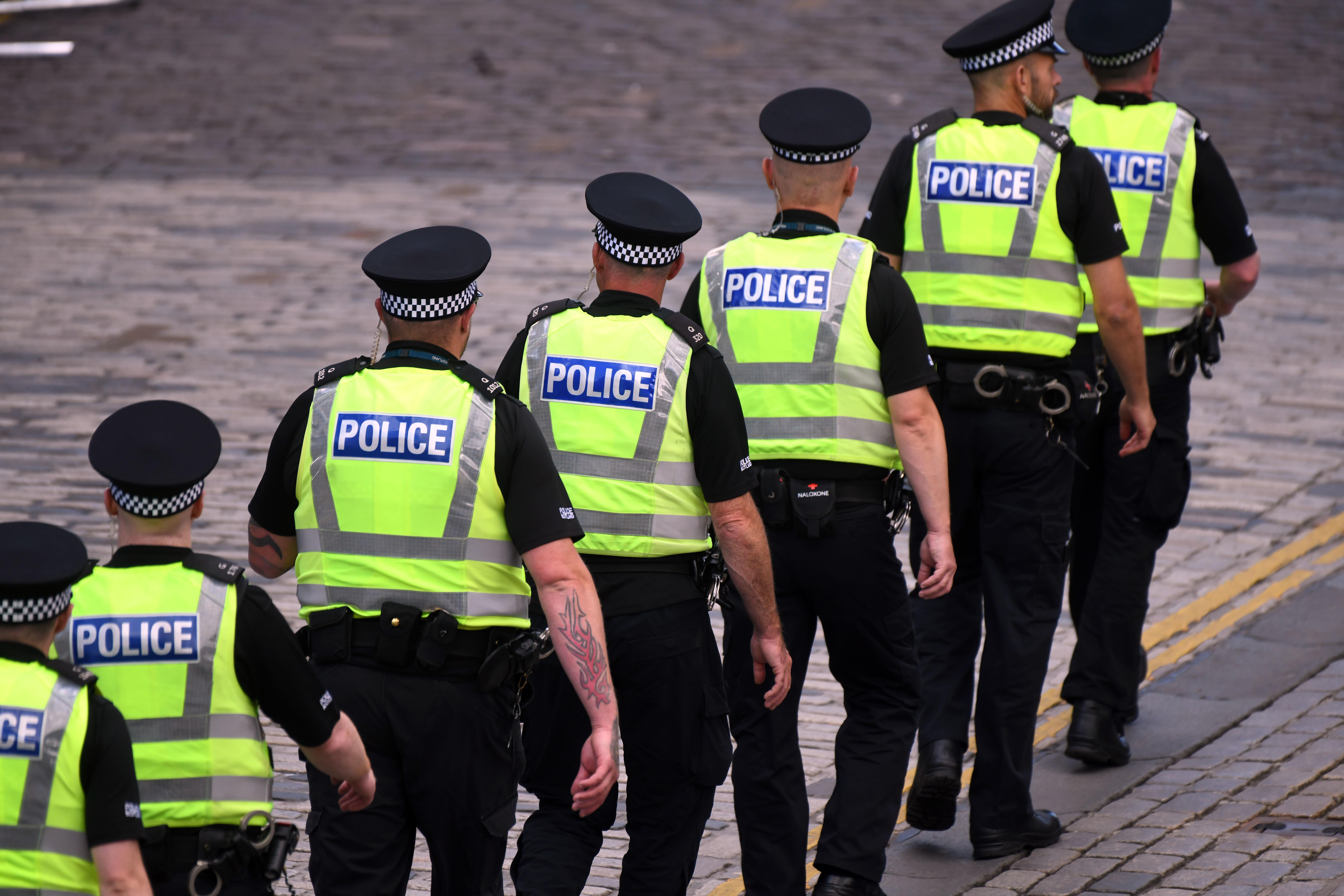 There was a large police presence on the Royal Mile before, during and after a coronation service with the King at St Giles’ Cathedral (PA)