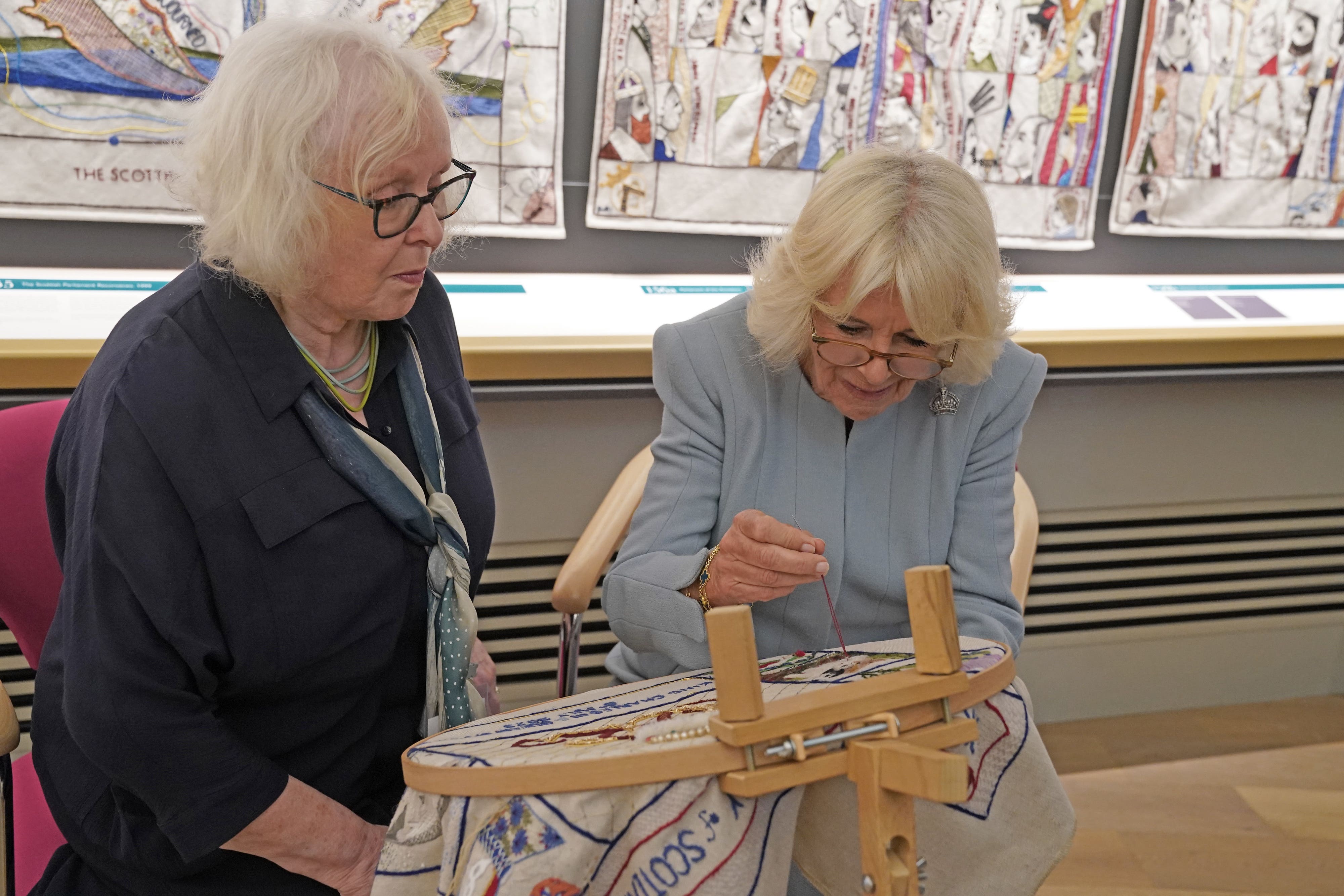 The Queen added the final stitch to a new panel on the Great Tapestry of Scotland (Andrew Milligan/PA)