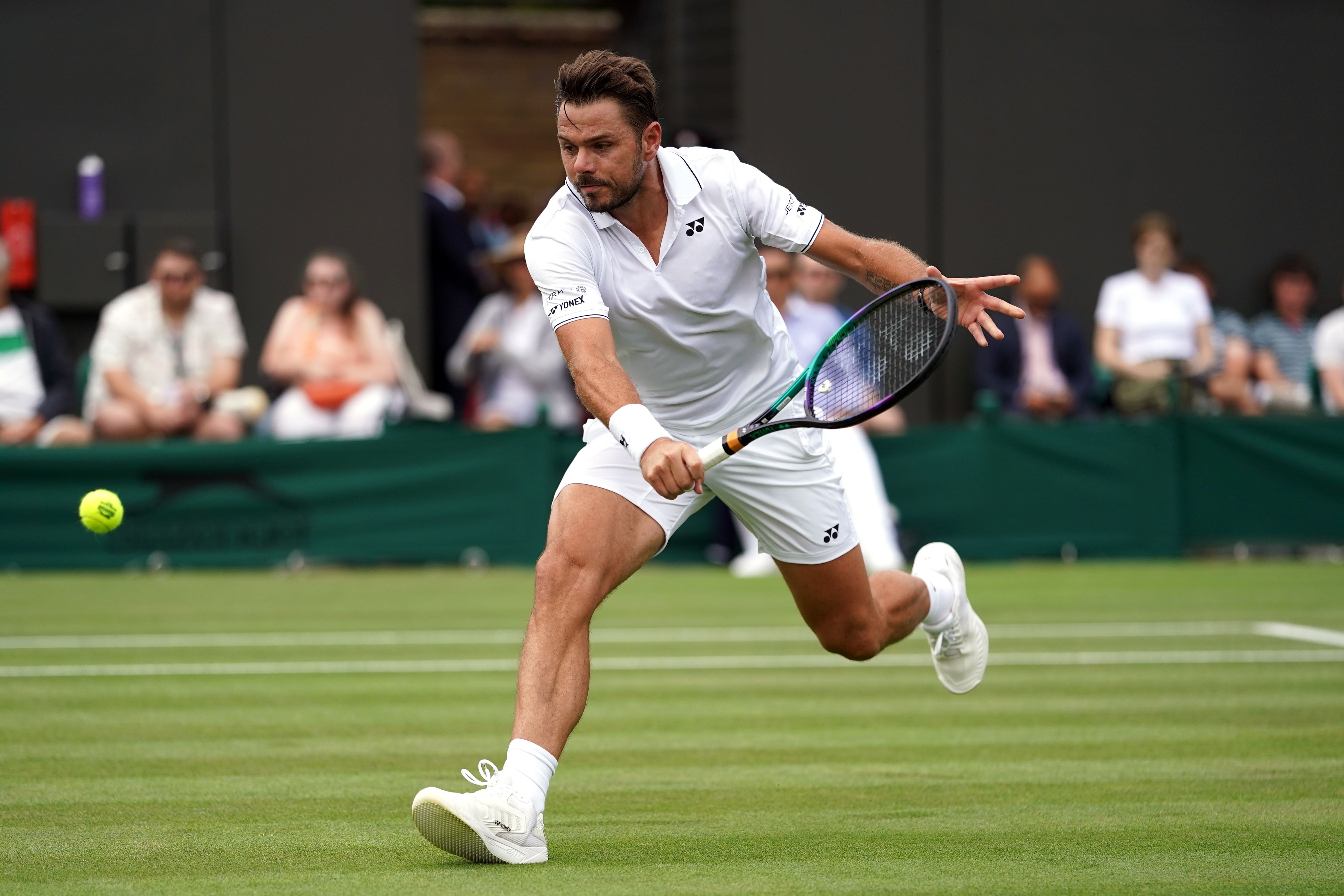 Stan Wawrinka chases down a backhand (Adam Davy/PA)