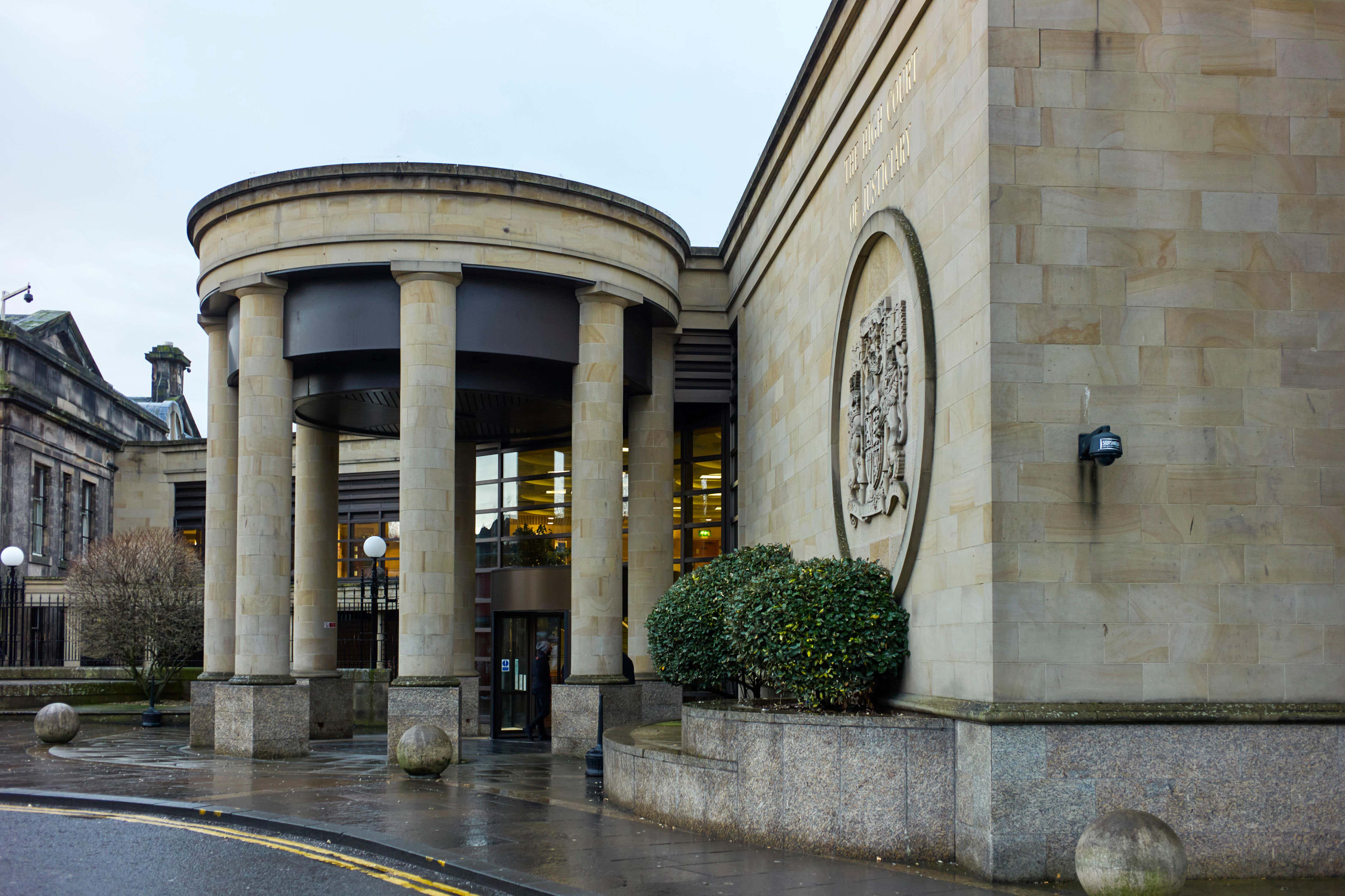 Gibson is standing trial at the High Court in Glasgow (Alamy/PA)