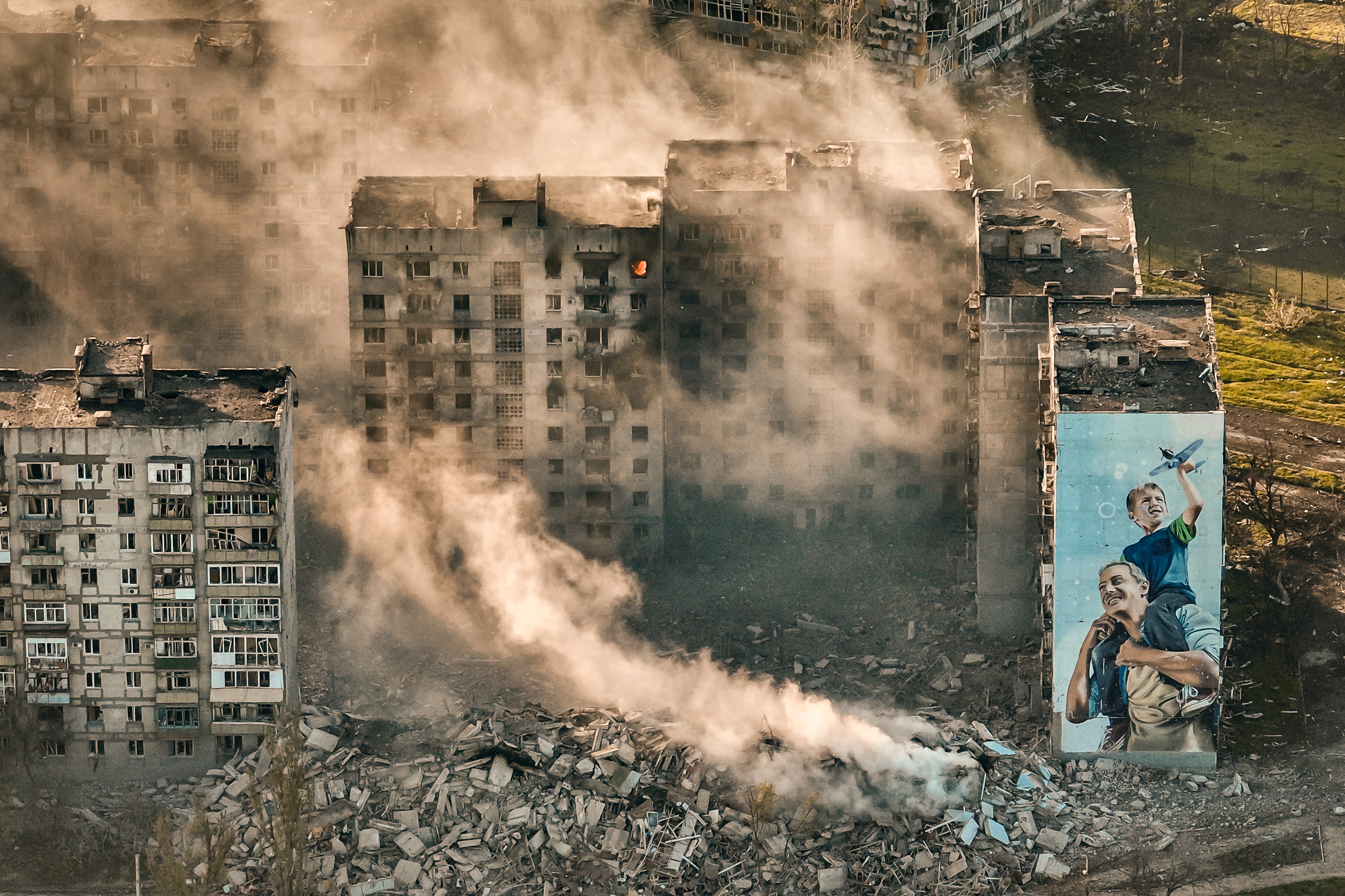 Smoke rises from a building in Bakhmut, the site of the heaviest battles between Russia and Ukraine