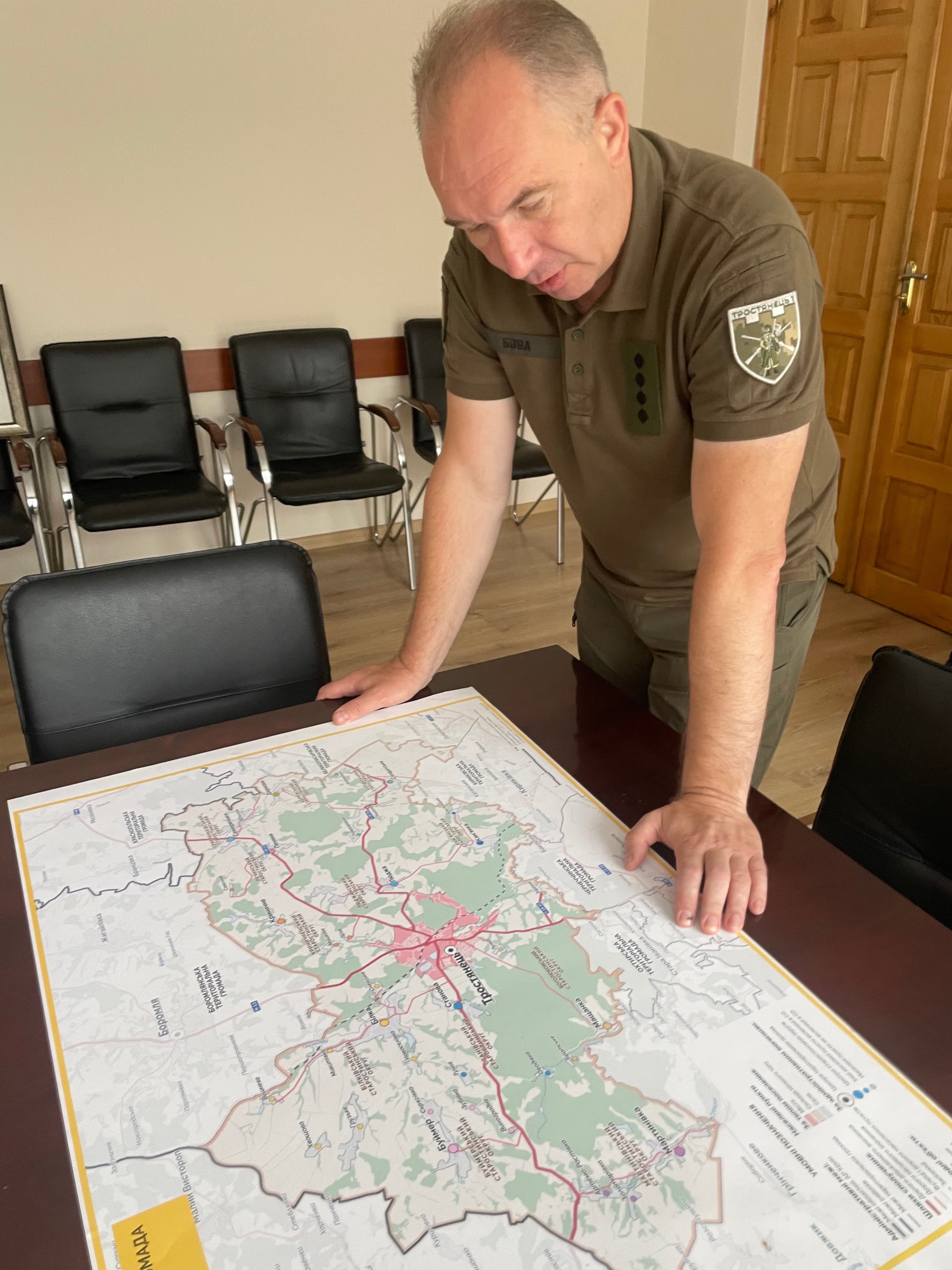 Mayor Yuriy Bova explains his plans for rebuilding Trostyanets