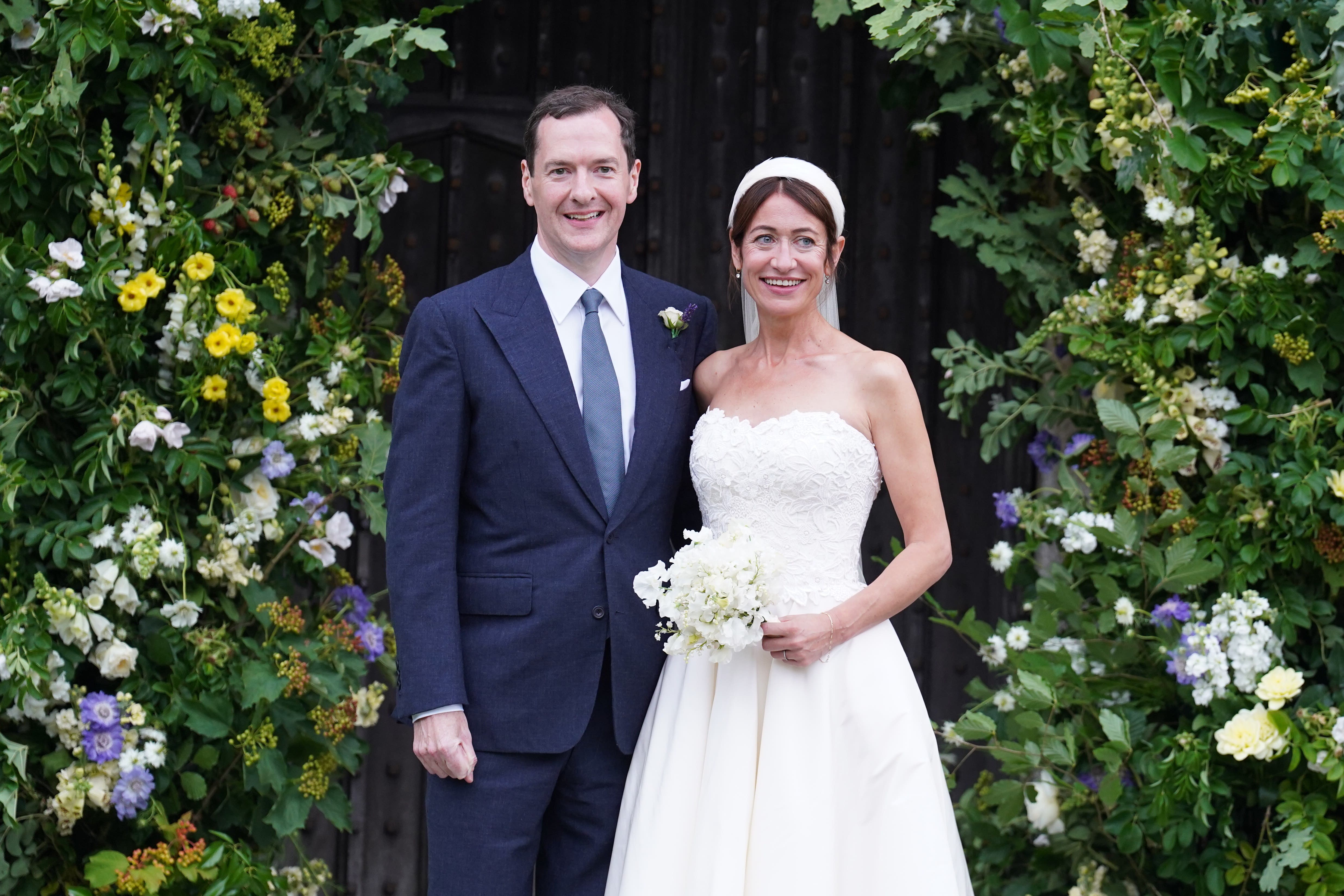 Former chancellor George Osborne with his wife and former adviser, Thea Rogers, outside St Mary’s Church in Brunton (Stefan Rousseau/PA)