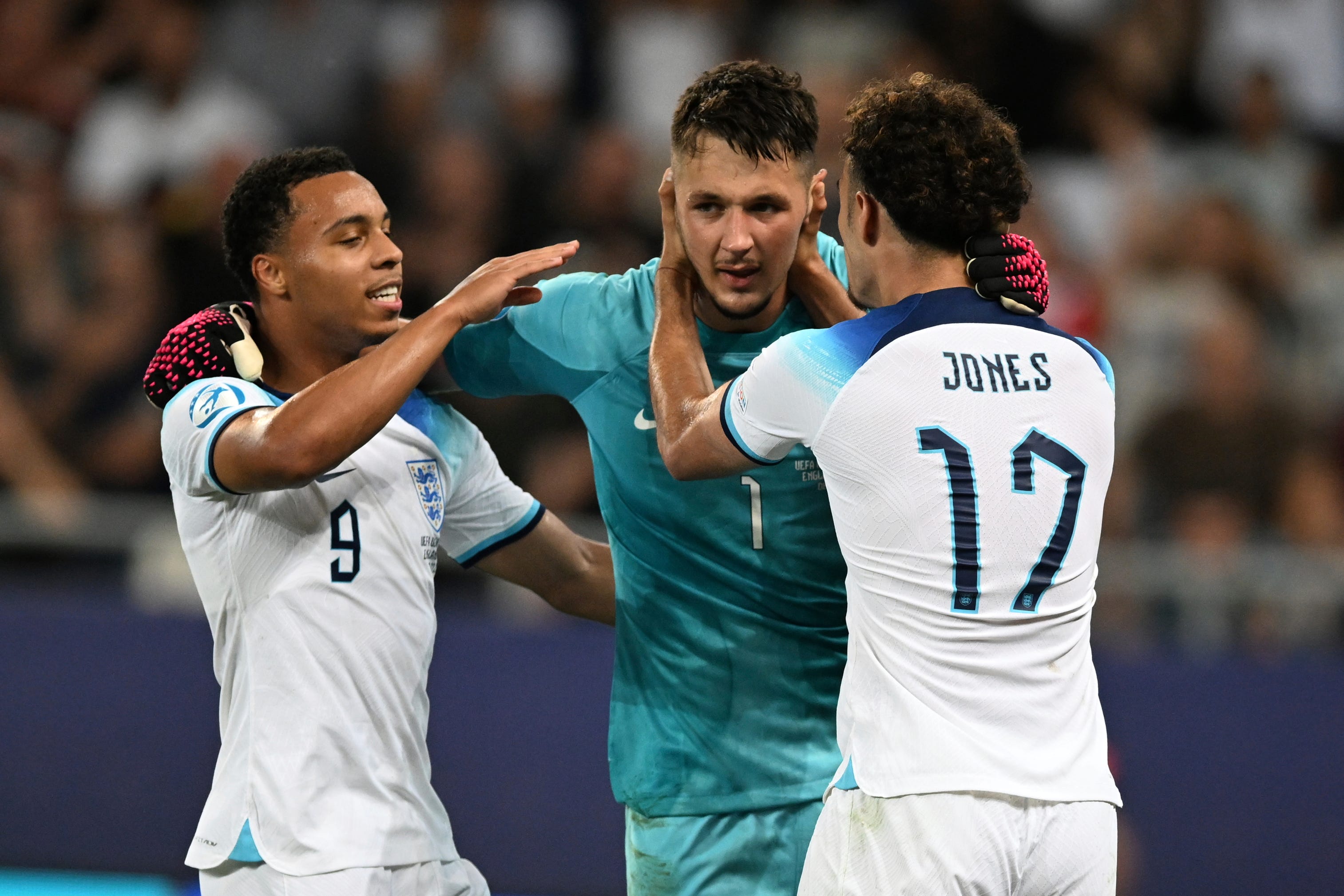 England goalkeeper James Trafford (centre) celebrates (Tamuna Kulumbegashvili/AP).